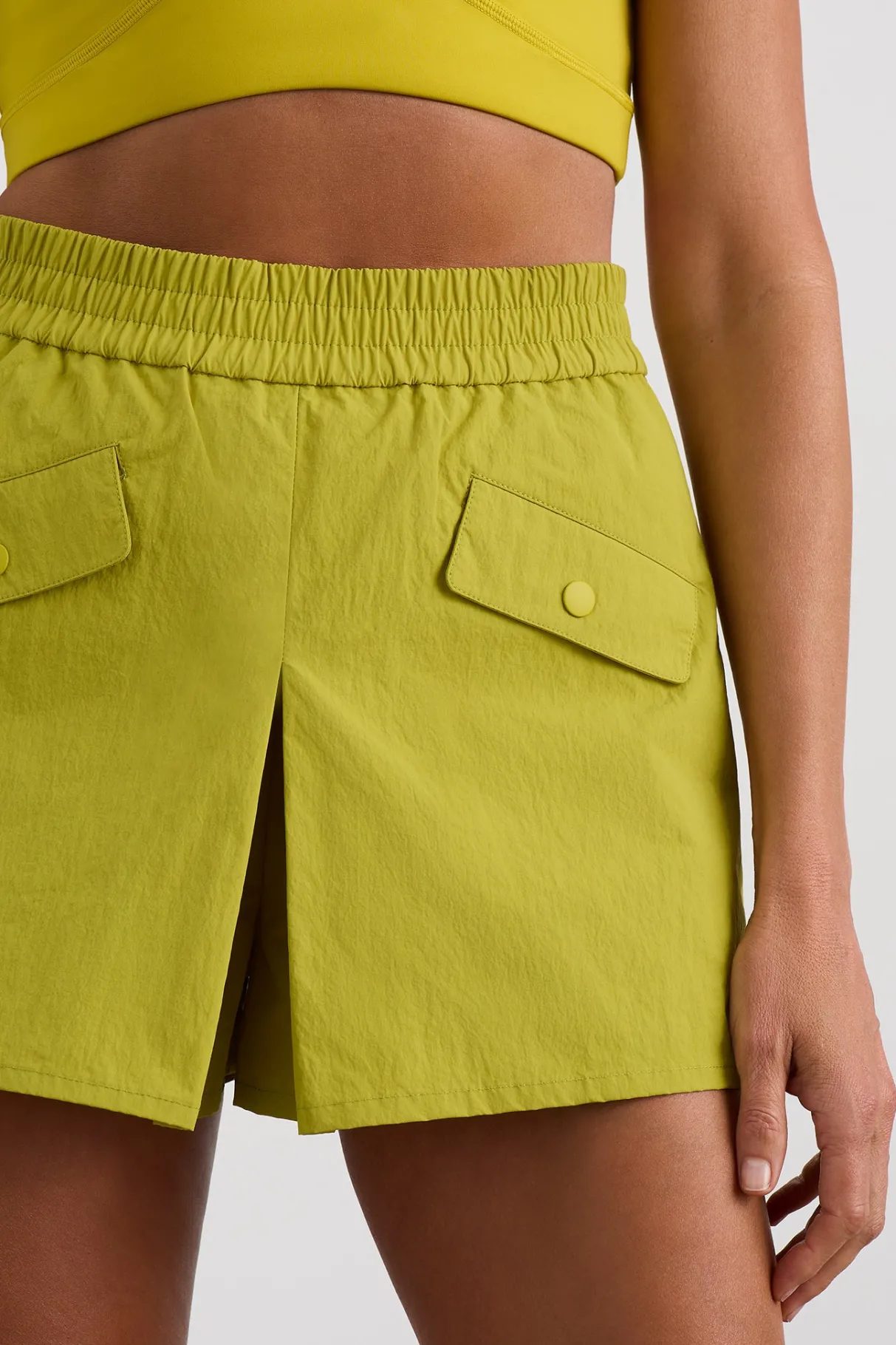 pleated_spray_mini_short__4.webp Store Aje ATHLETICA Pleated Spray Mini Short 648 Solar Blaze