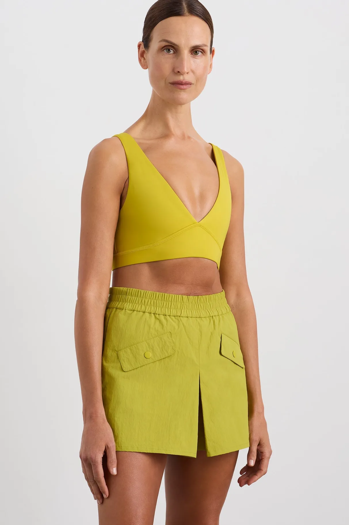 plunge_sports_bra__0.webp Shop Aje ATHLETICA Plunge Sports Bra 337 Solar Blaze