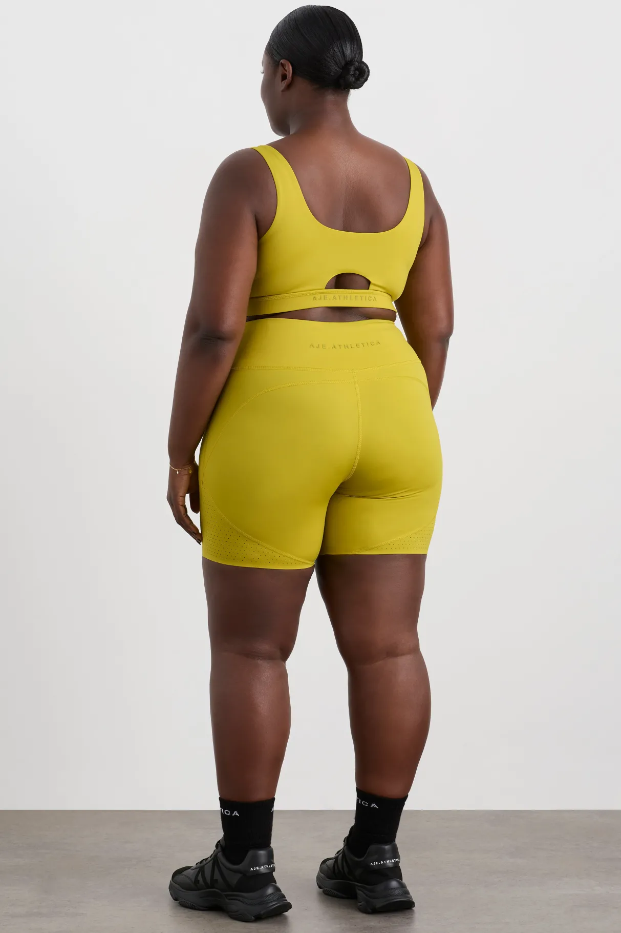 plunge_sports_bra__13.webp Shop Aje ATHLETICA Plunge Sports Bra 337 Solar Blaze
