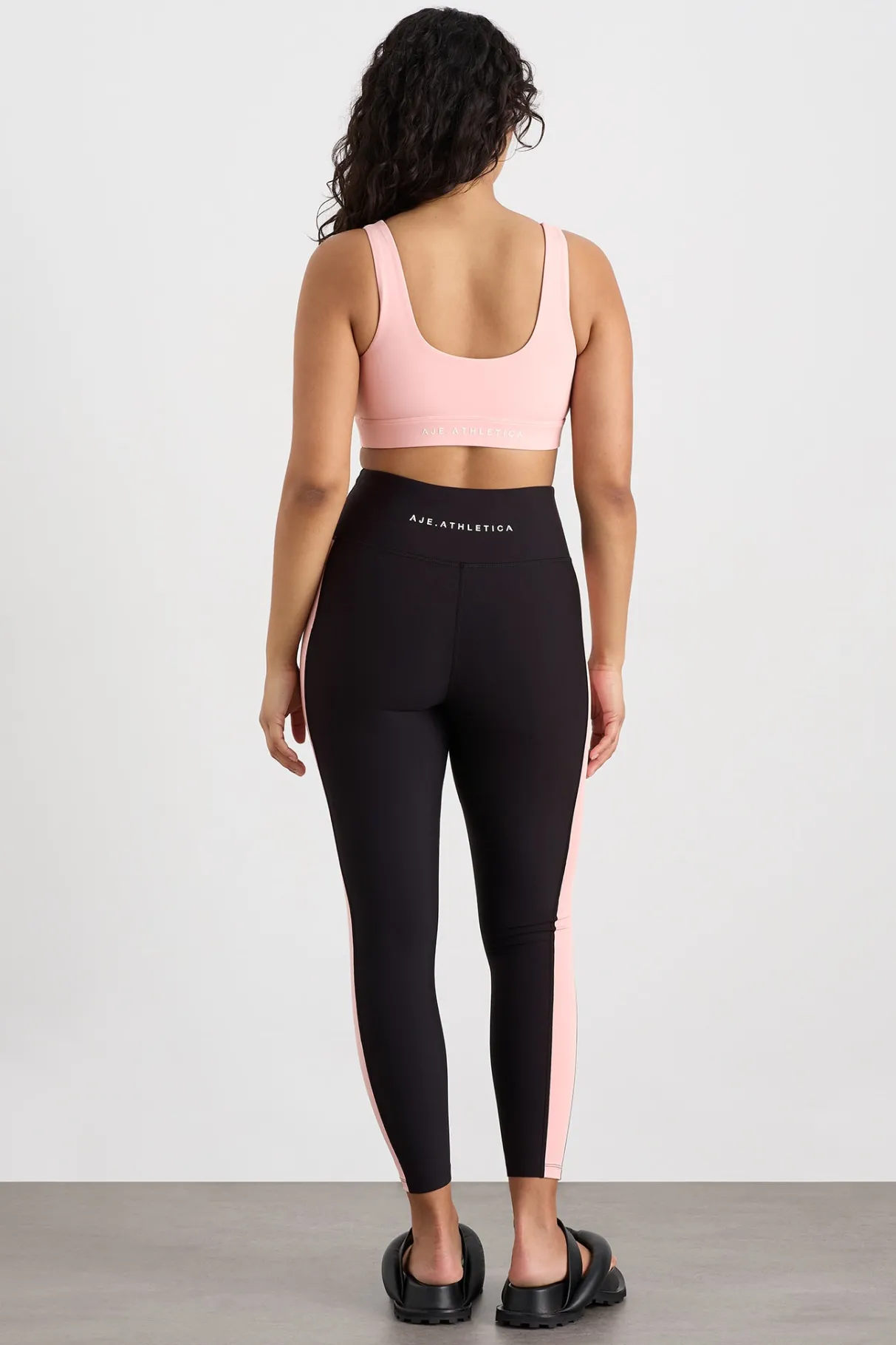 plunge_sports_bra__8-2.webp Shop Aje ATHLETICA Plunge Sports Bra 337 Millenial Pink