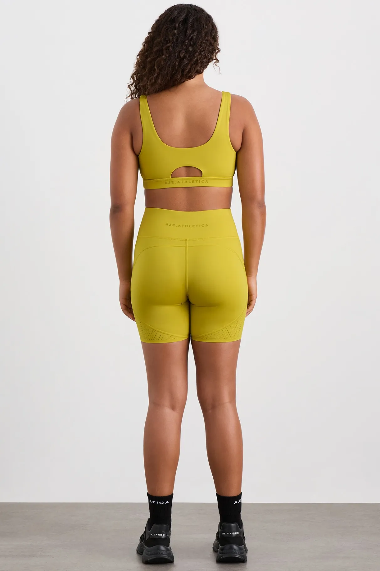 plunge_sports_bra__9.webp Shop Aje ATHLETICA Plunge Sports Bra 337 Solar Blaze