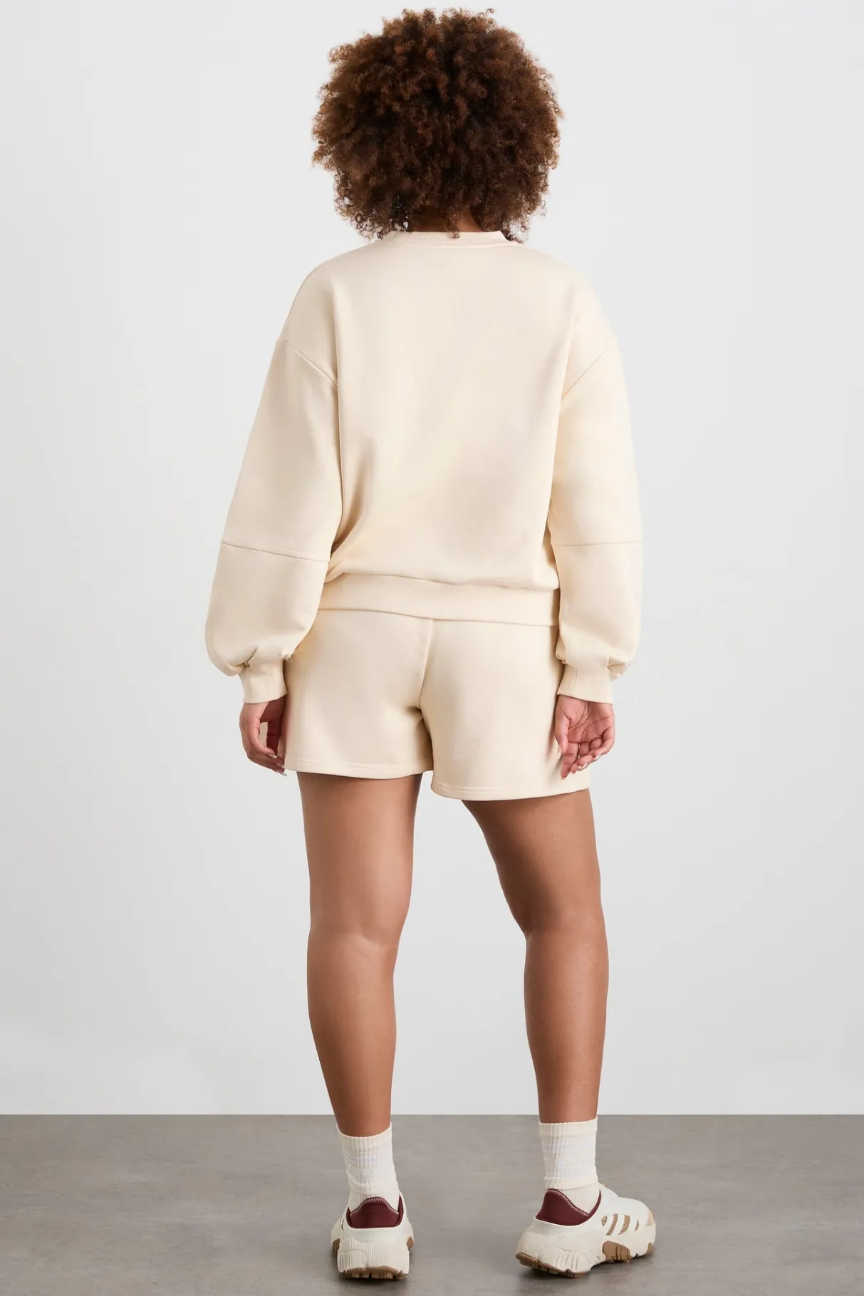 relaxed_logo_crew_jumper__12.webp Fashion Aje ATHLETICA Relaxed Logo Crew Jumper 417 Rice White