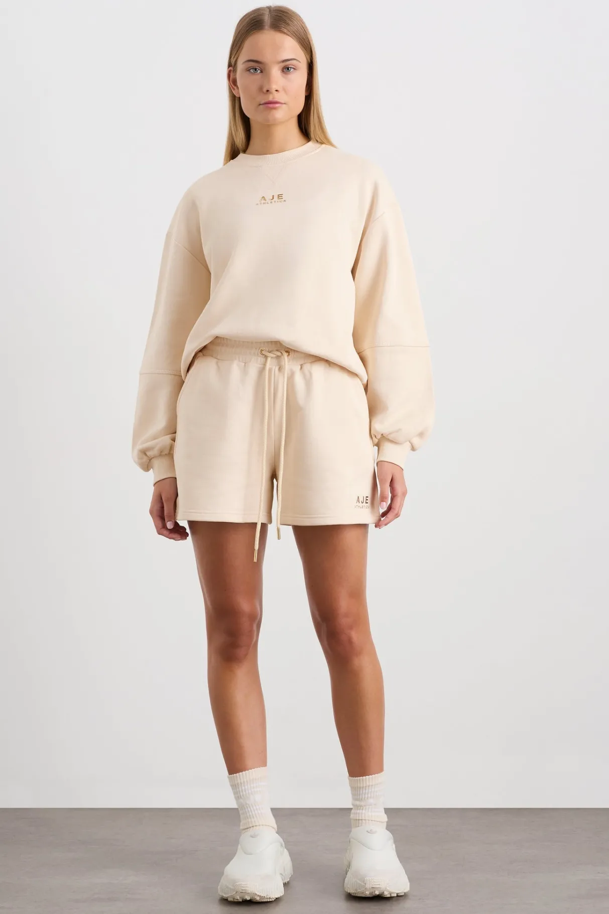 relaxed_logo_crew_jumper__2.webp Fashion Aje ATHLETICA Relaxed Logo Crew Jumper 417 Rice White