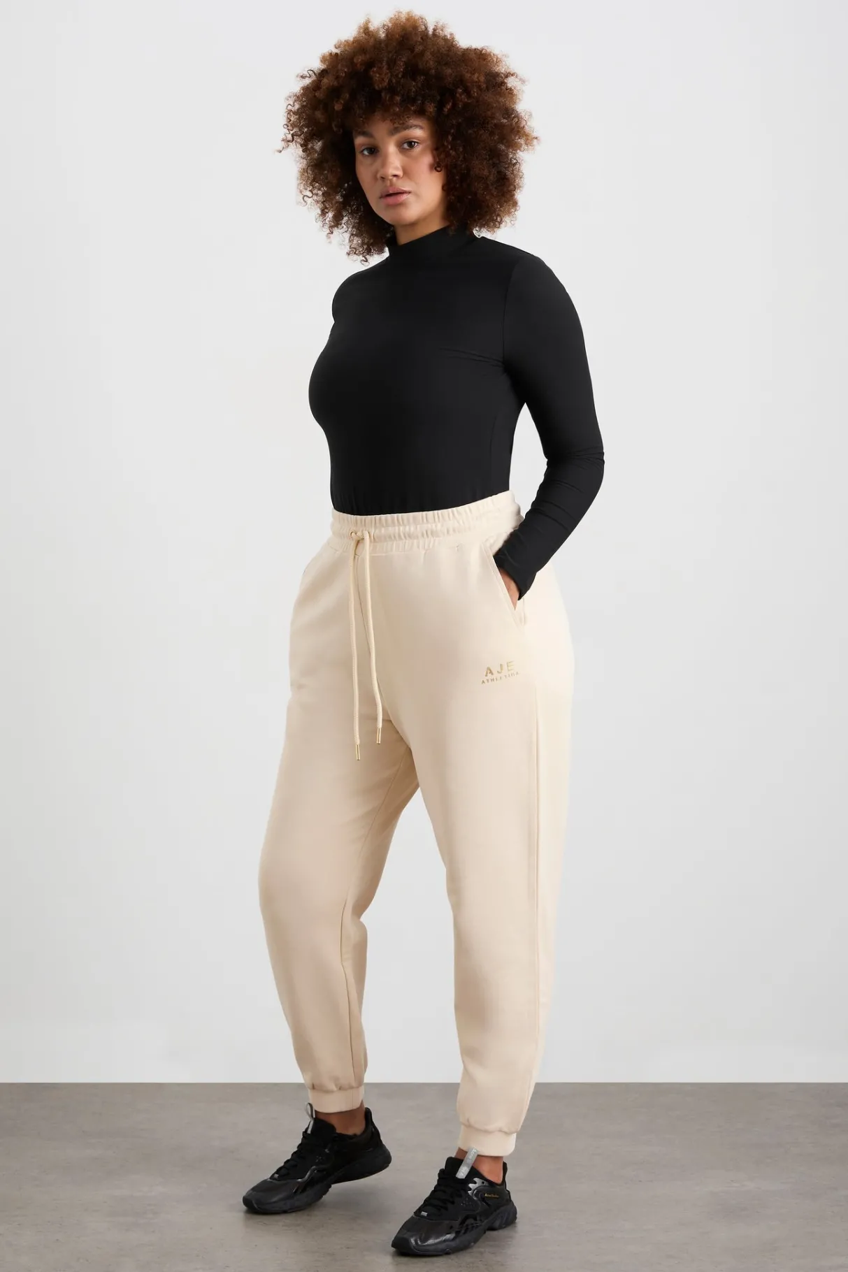 relaxed_track_pants__10-1.webp Shop Aje ATHLETICA Relaxed Track Pants 508 Rice White