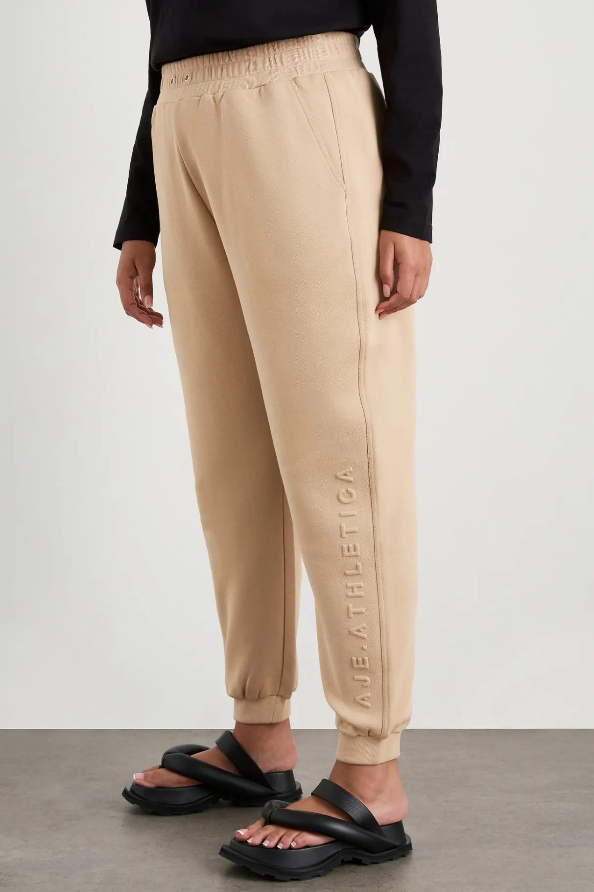 relaxed_track_pants__10.webp Fashion Aje ATHLETICA Relaxed Track Pants 508 Biscotti Beige