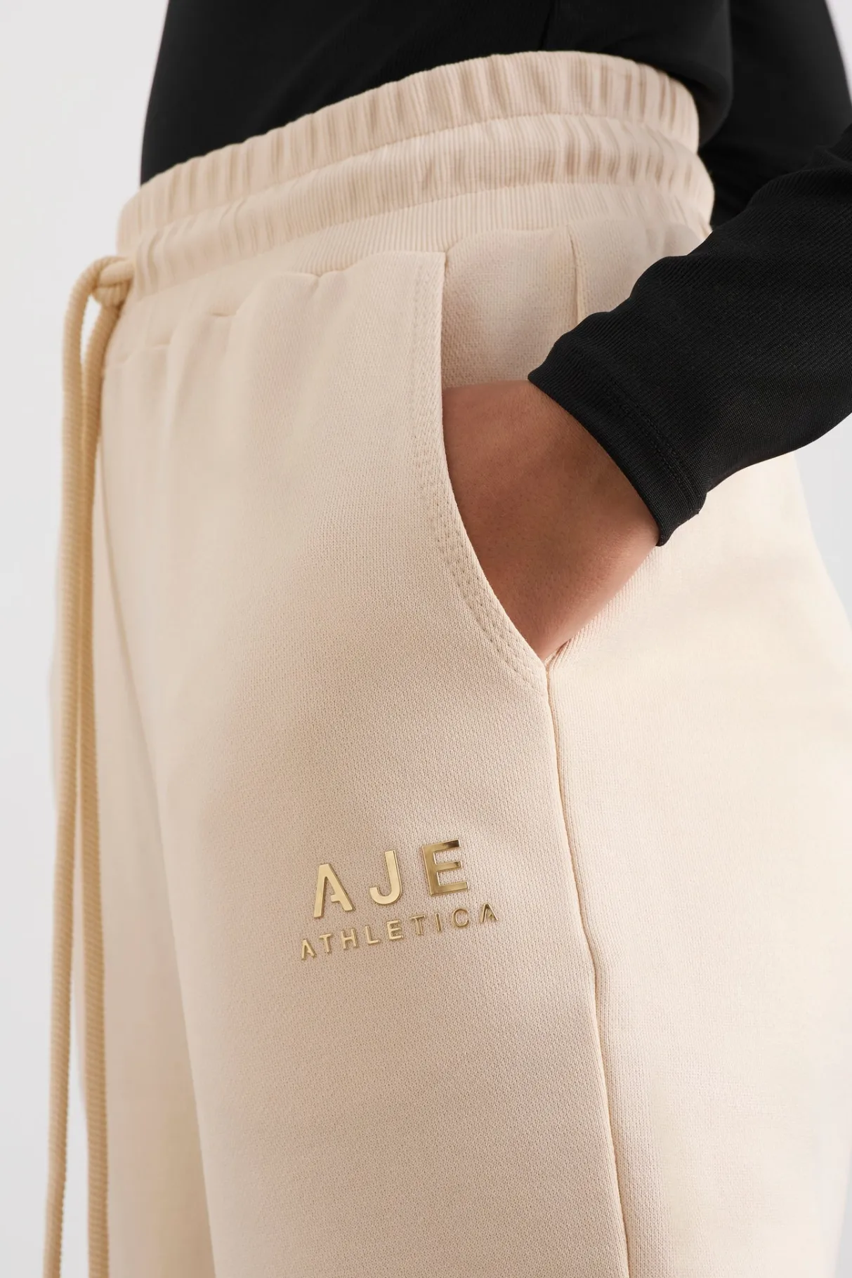 relaxed_track_pants__8-1.webp Shop Aje ATHLETICA Relaxed Track Pants 508 Rice White