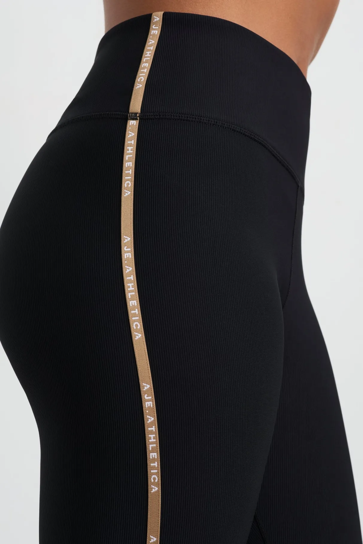 ribbed_logo_ankle_length_legging__7.webp Best Sale Aje ATHLETICA Ribbed Logo Ankle Length Legging 203 Black/Natural Tan