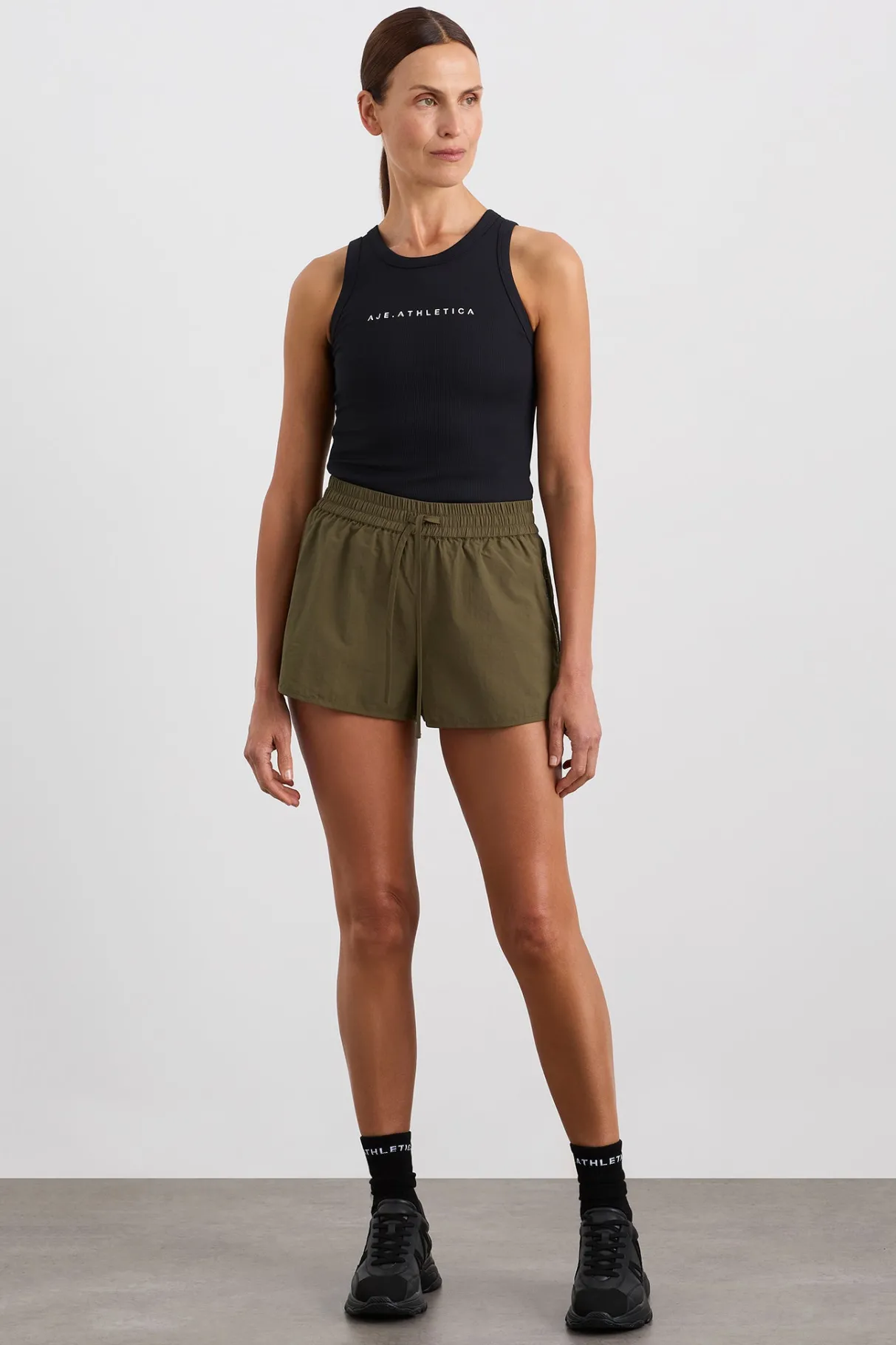 running_spray_short__0.webp Sale Aje ATHLETICA Running Spray Short 643 Deep Khaki