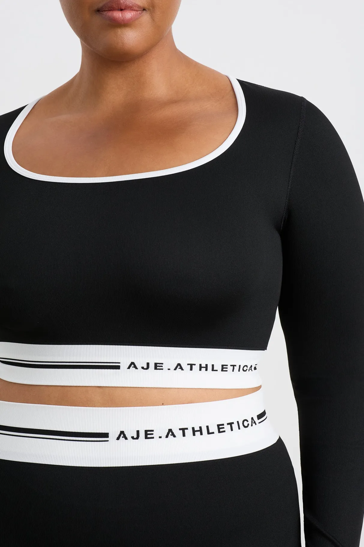 seamless_long_sleeve_crop__11.webp Discount Aje ATHLETICA Seamless Long Sleeve Crop 356 Black