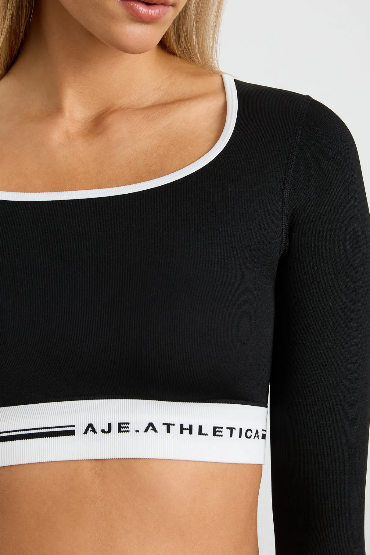 seamless_long_sleeve_crop__3.webp Discount Aje ATHLETICA Seamless Long Sleeve Crop 356 Black