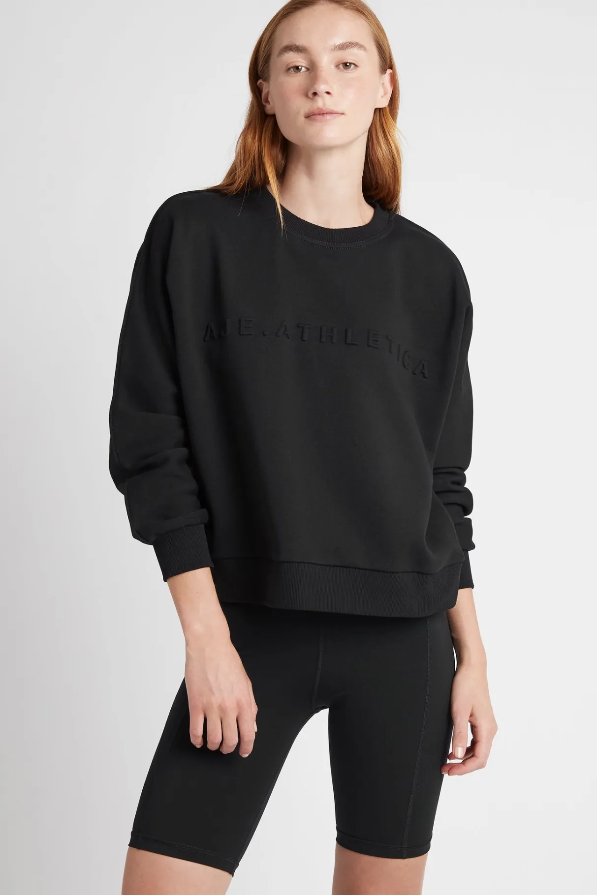 signature_embossed_logo_crew_jumper__0.webp Sale Aje ATHLETICA Signature Embossed Logo Crew Jumper 401 Black