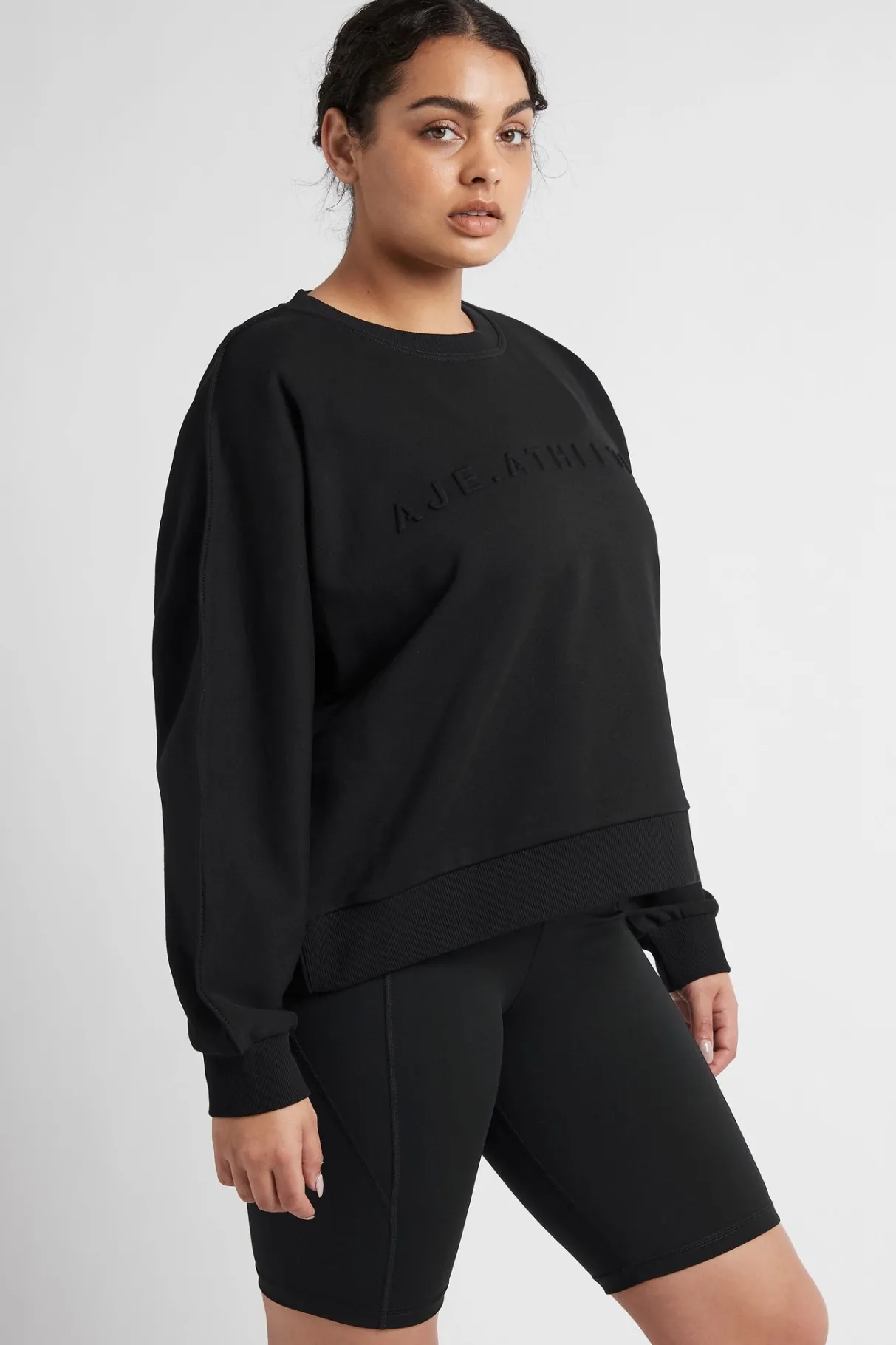 signature_embossed_logo_crew_jumper__12.webp Sale Aje ATHLETICA Signature Embossed Logo Crew Jumper 401 Black
