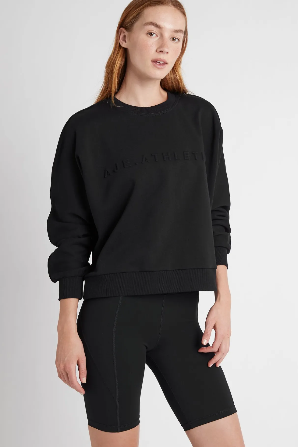 signature_embossed_logo_crew_jumper__2.webp Sale Aje ATHLETICA Signature Embossed Logo Crew Jumper 401 Black