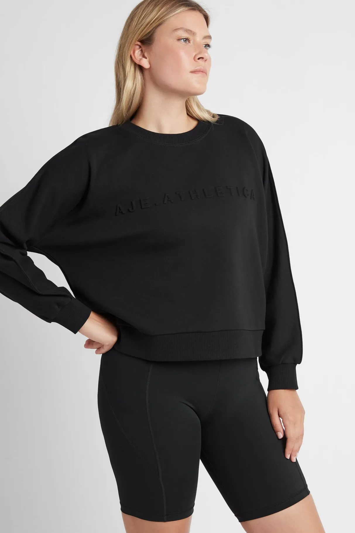 signature_embossed_logo_crew_jumper__7.webp Sale Aje ATHLETICA Signature Embossed Logo Crew Jumper 401 Black