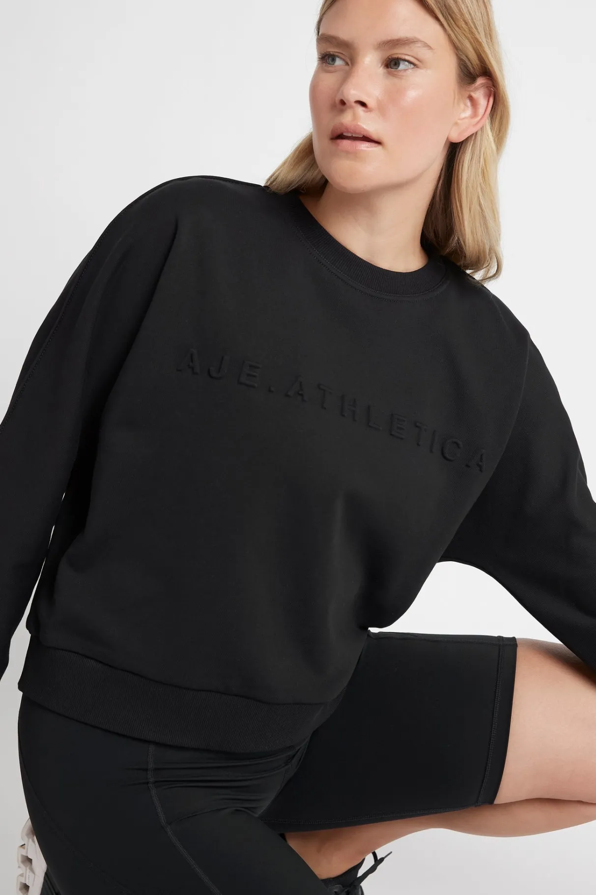 signature_embossed_logo_crew_jumper__8.webp Sale Aje ATHLETICA Signature Embossed Logo Crew Jumper 401 Black