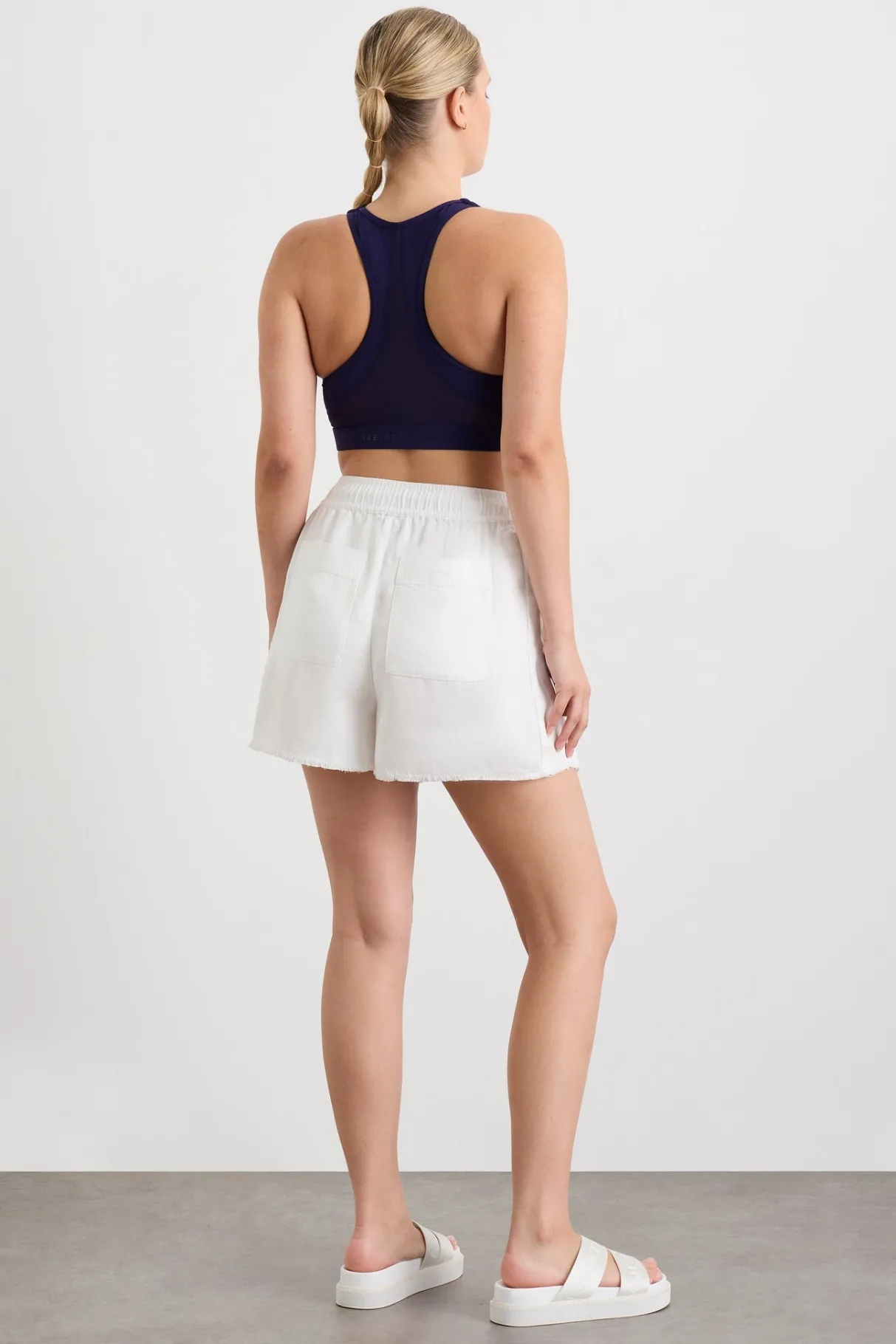 signature_logo_short__11.webp Store Aje ATHLETICA Signature Logo Short 603 White