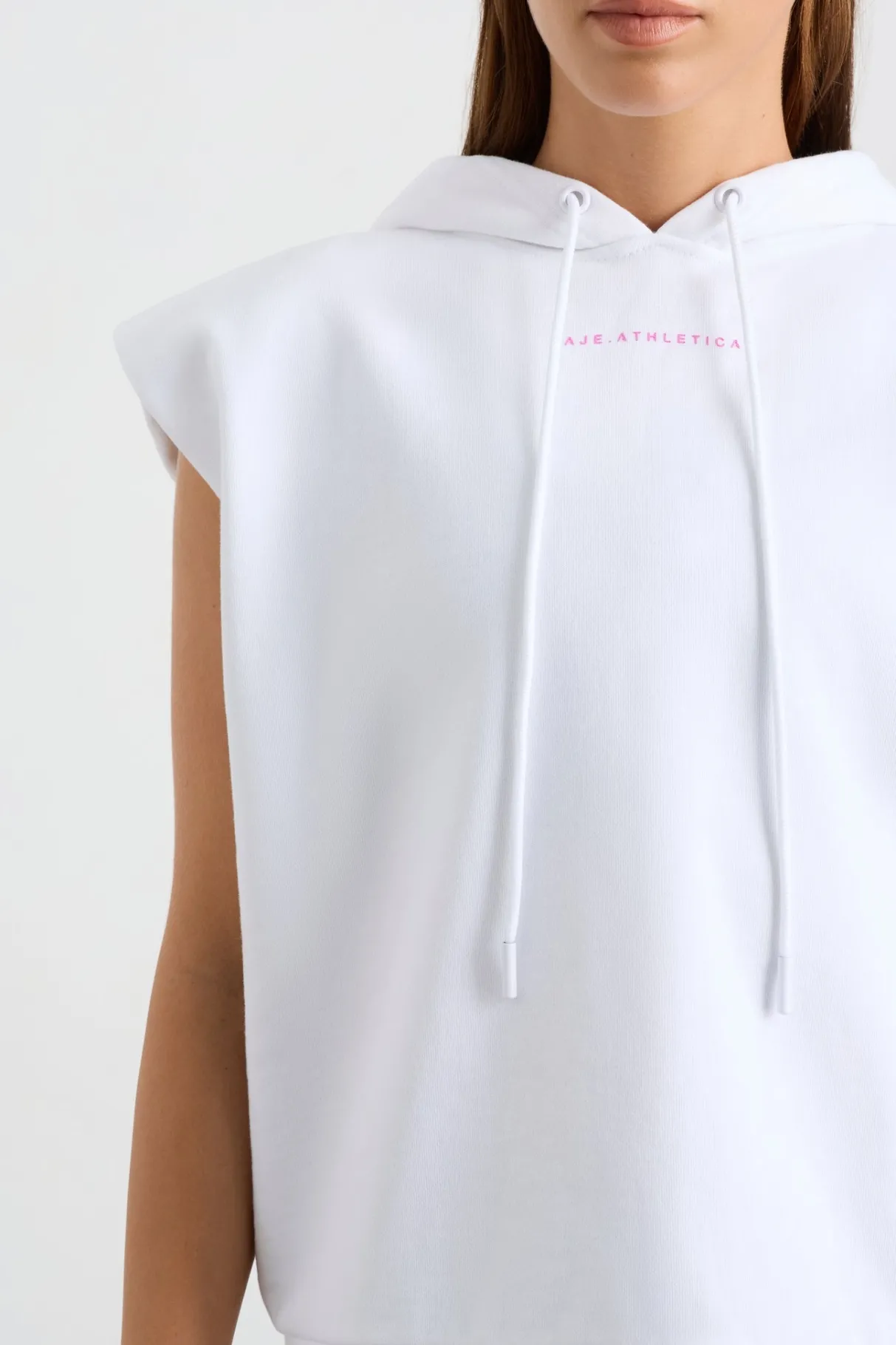 sleeveless_logo_hoodie__3.webp Online Aje ATHLETICA Sleeveless Logo Hoodie 402 White/Pink