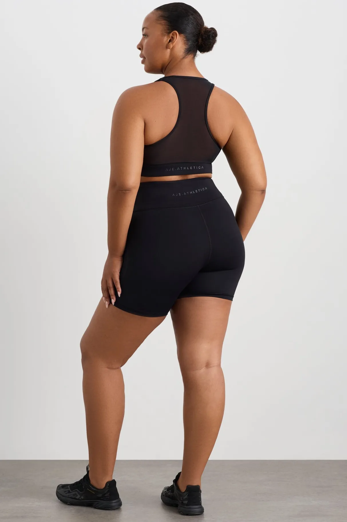 spliced_mesh_sports_bra__15.webp Discount Aje ATHLETICA Spliced Mesh Sports Bra 370 Black