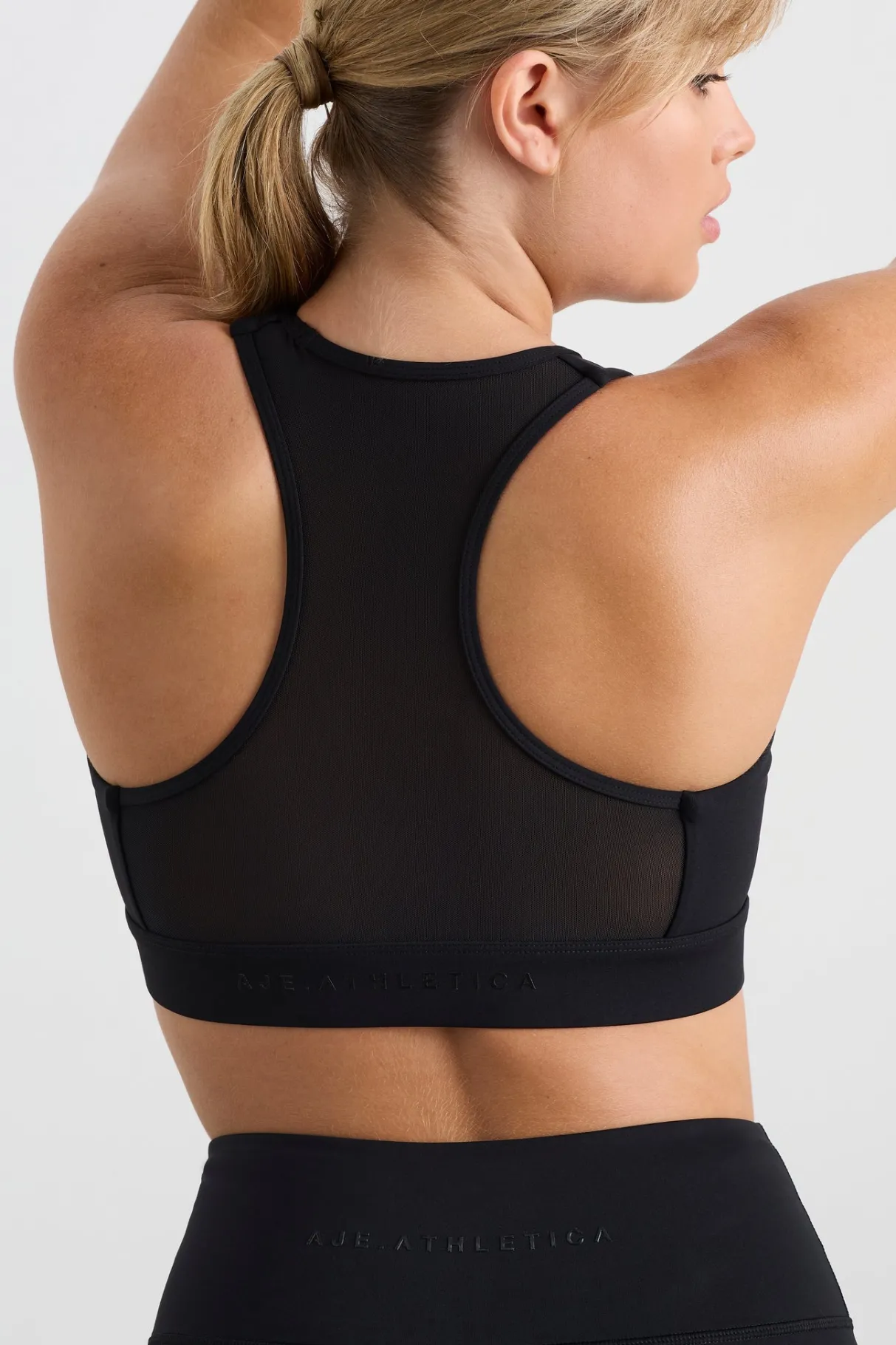 spliced_mesh_sports_bra__9.webp Discount Aje ATHLETICA Spliced Mesh Sports Bra 370 Black