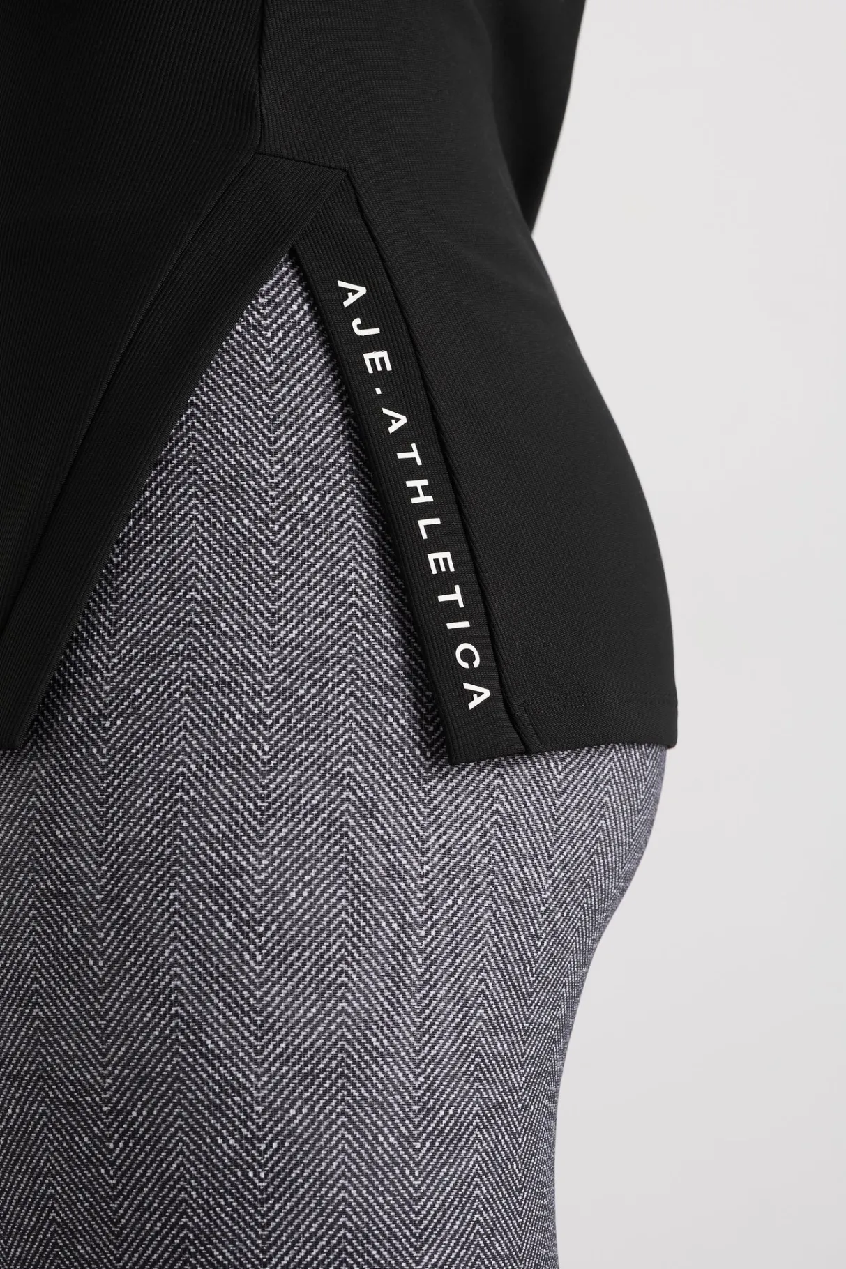 split_hem_mock_top__3-1.webp Flash Sale Aje ATHLETICA Split Hem Mock Top 434 Black