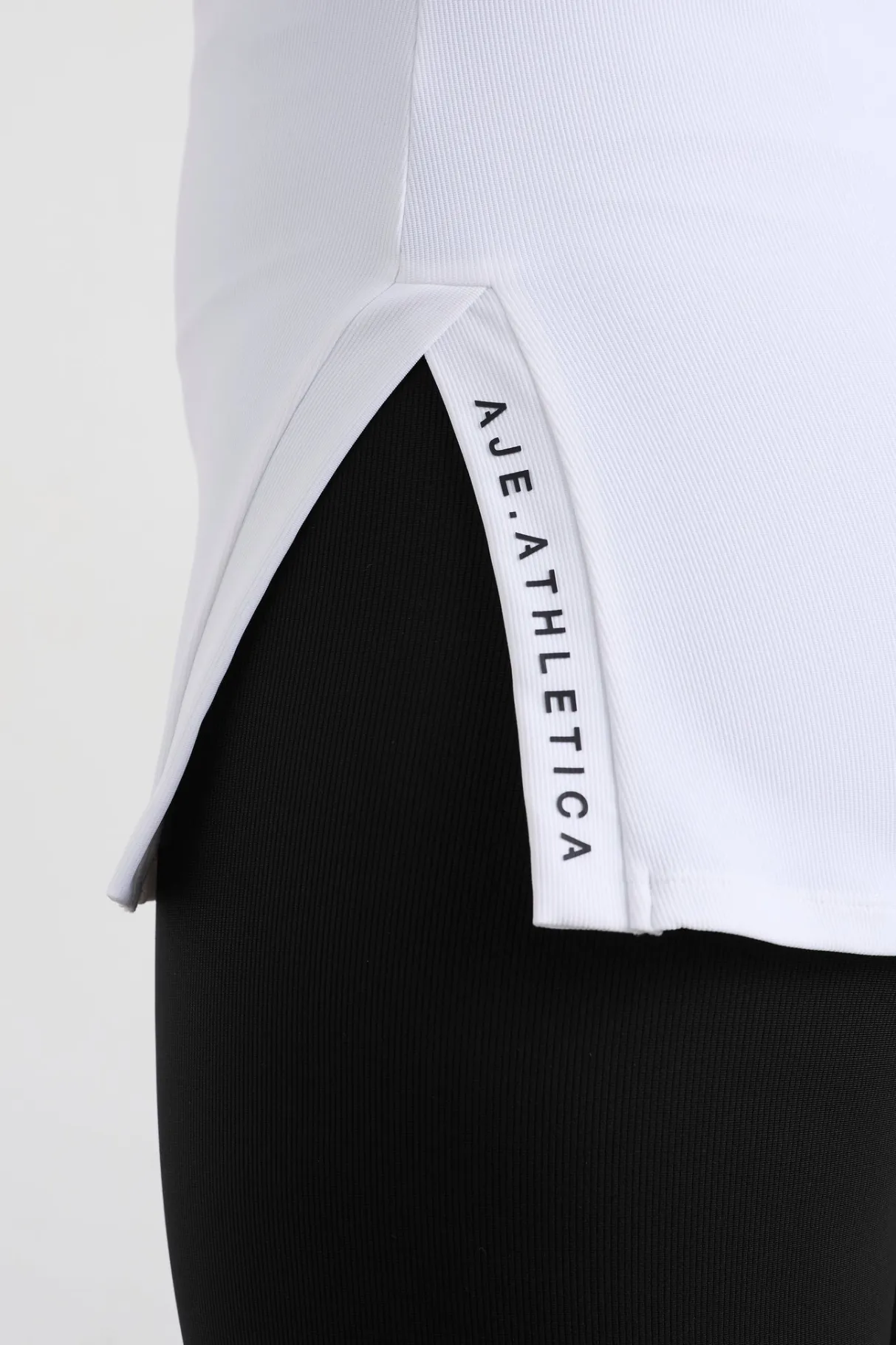 split_hem_mock_top__7.webp New Aje ATHLETICA Split Hem Mock Top 434 White