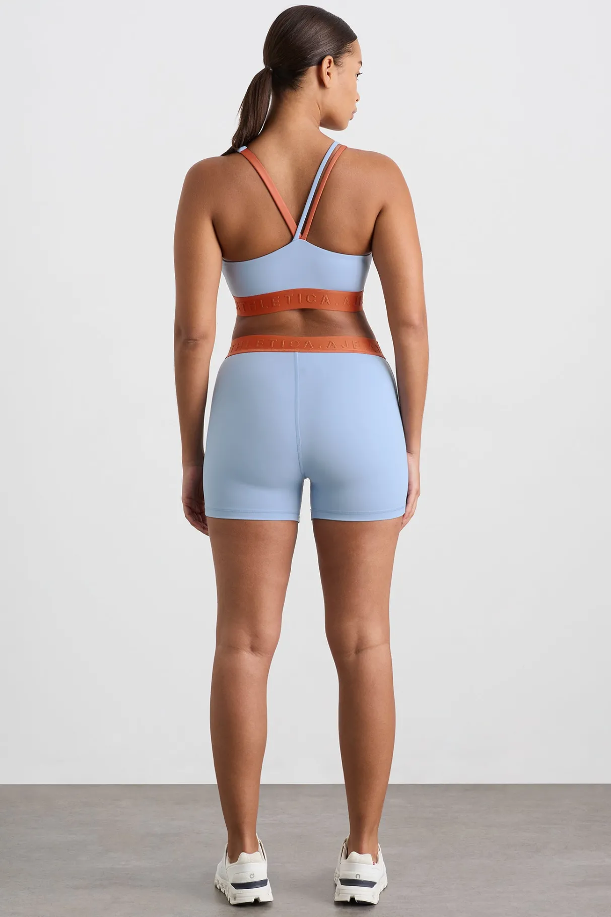 split_strap_logo_bra__10.webp Hot Aje ATHLETICA Split Strap Logo Bra 366 Steel Blue Copper Orange