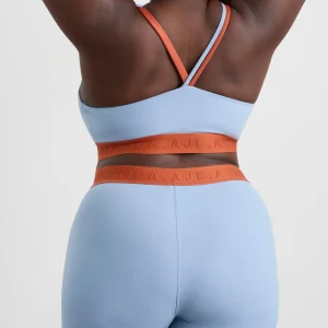 Hot Aje ATHLETICA Split Strap Logo Bra 366 Steel Blue Copper Orange