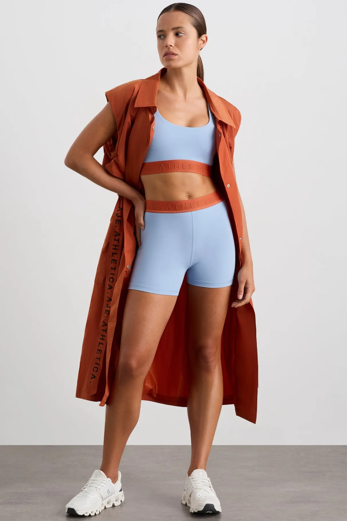 split_strap_logo_bra__5.webp Hot Aje ATHLETICA Split Strap Logo Bra 366 Steel Blue Copper Orange