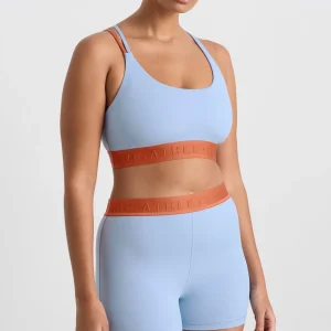 Hot Aje ATHLETICA Split Strap Logo Bra 366 Steel Blue Copper Orange