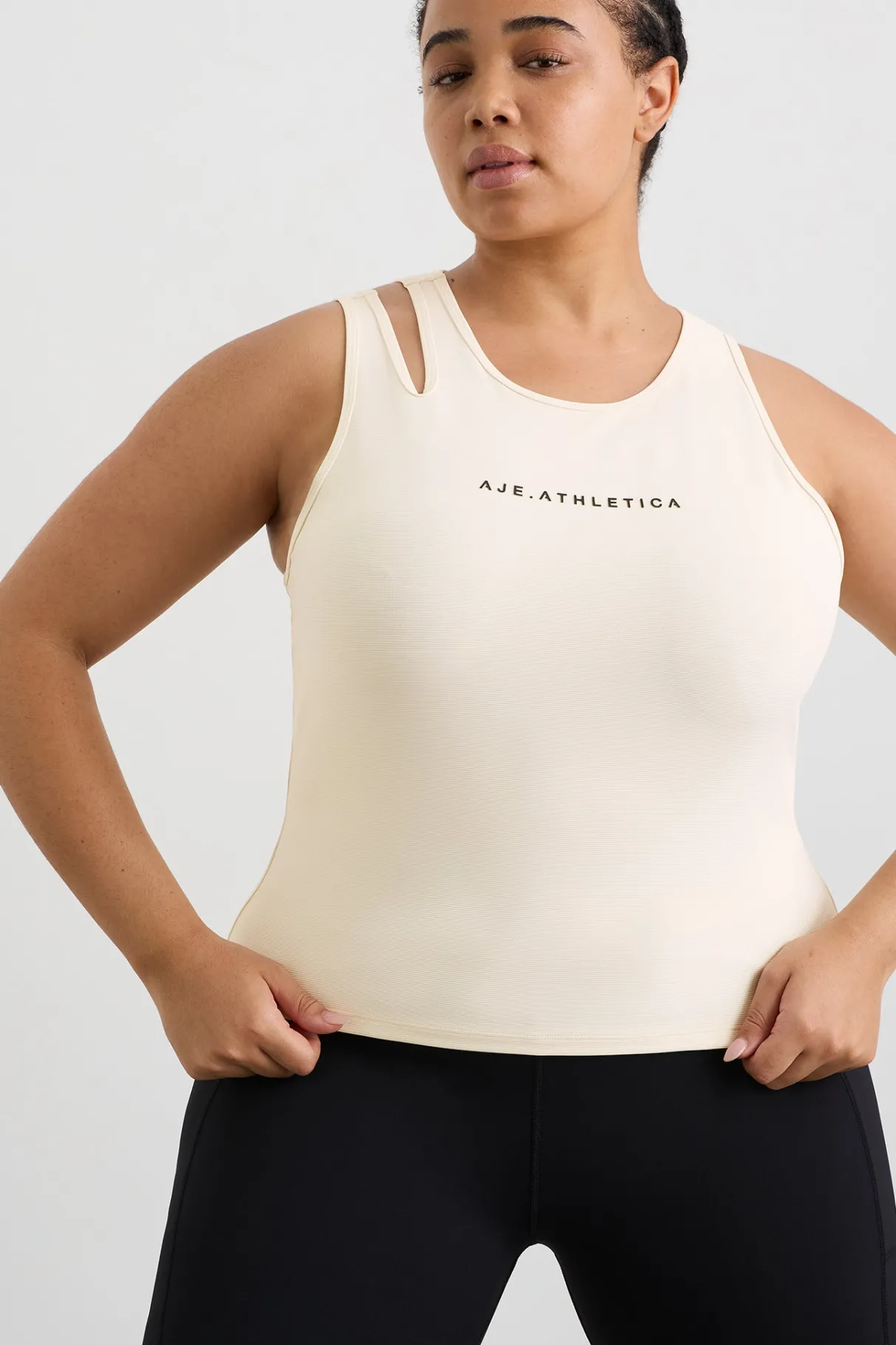 split_strap_tank__11-1.webp New Aje ATHLETICA Split Strap Tank 147 Limestone Beige
