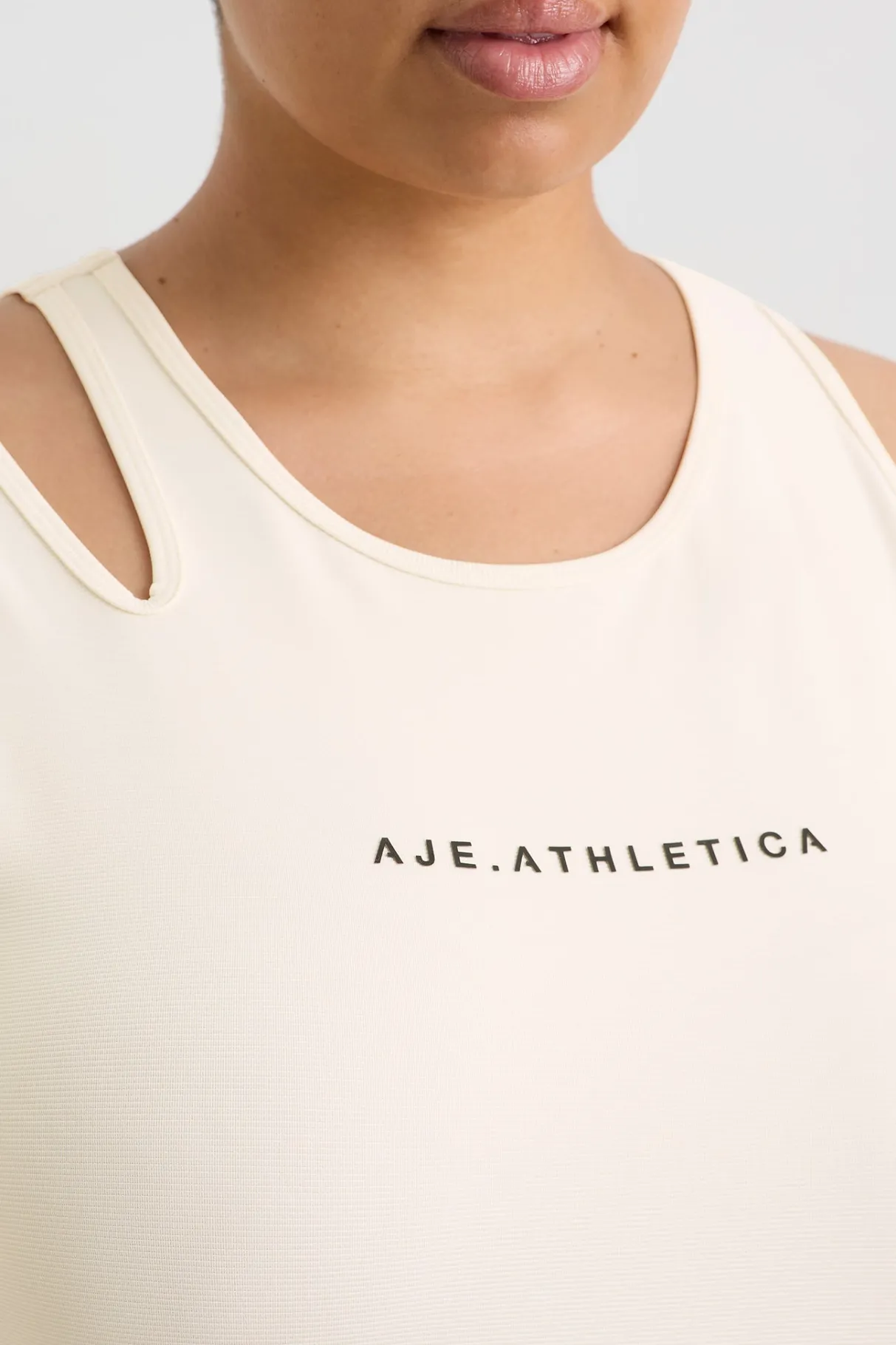 split_strap_tank__13-1.webp New Aje ATHLETICA Split Strap Tank 147 Limestone Beige