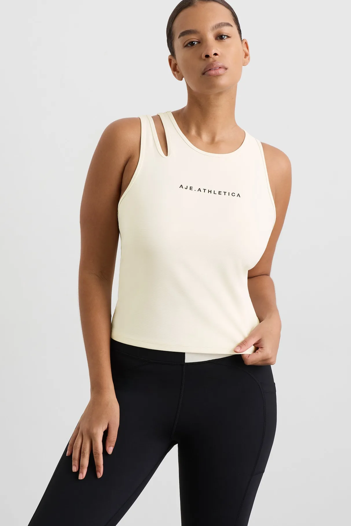 split_strap_tank__6-1.webp New Aje ATHLETICA Split Strap Tank 147 Limestone Beige