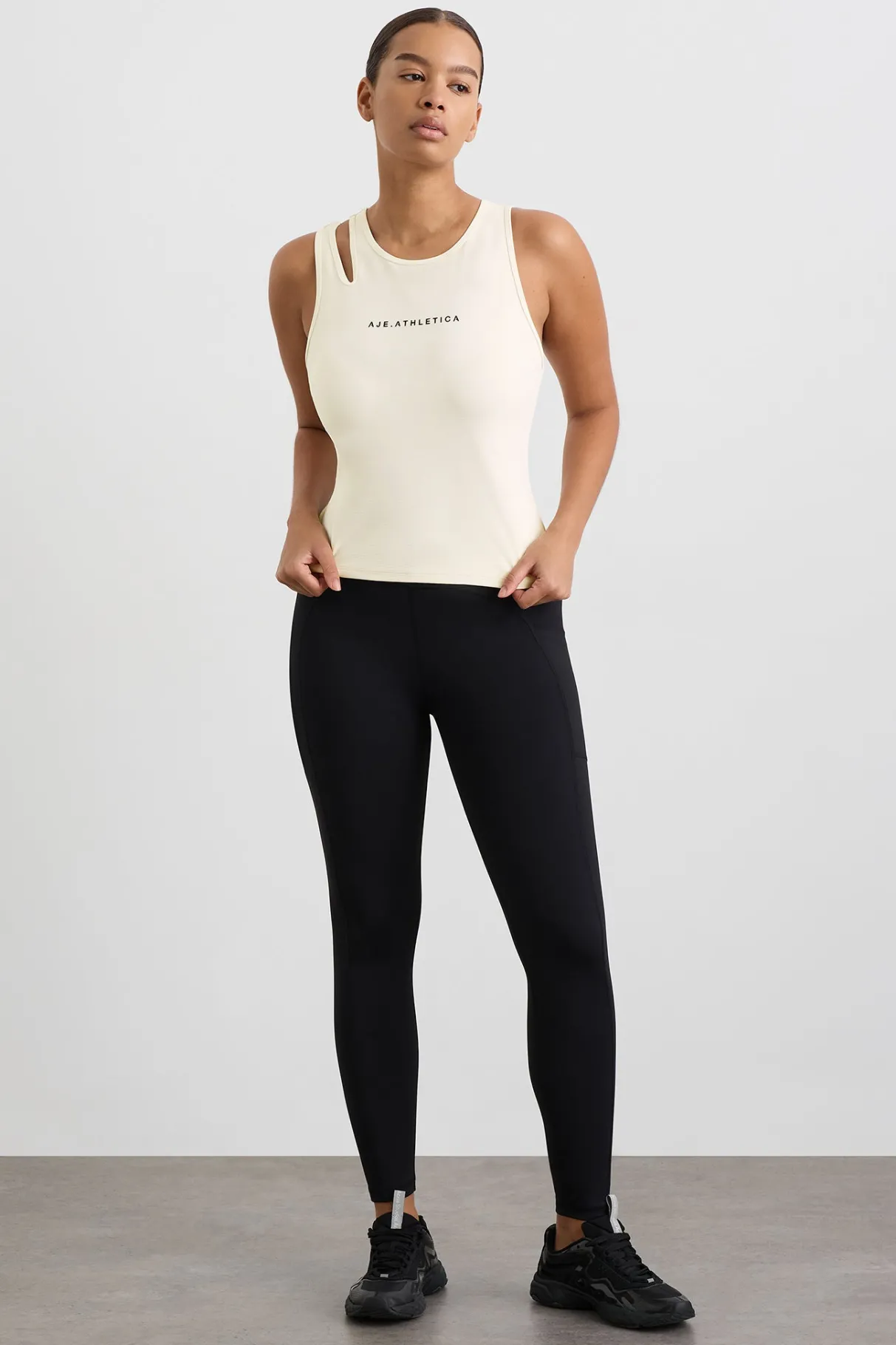 split_strap_tank__7-1.webp New Aje ATHLETICA Split Strap Tank 147 Limestone Beige