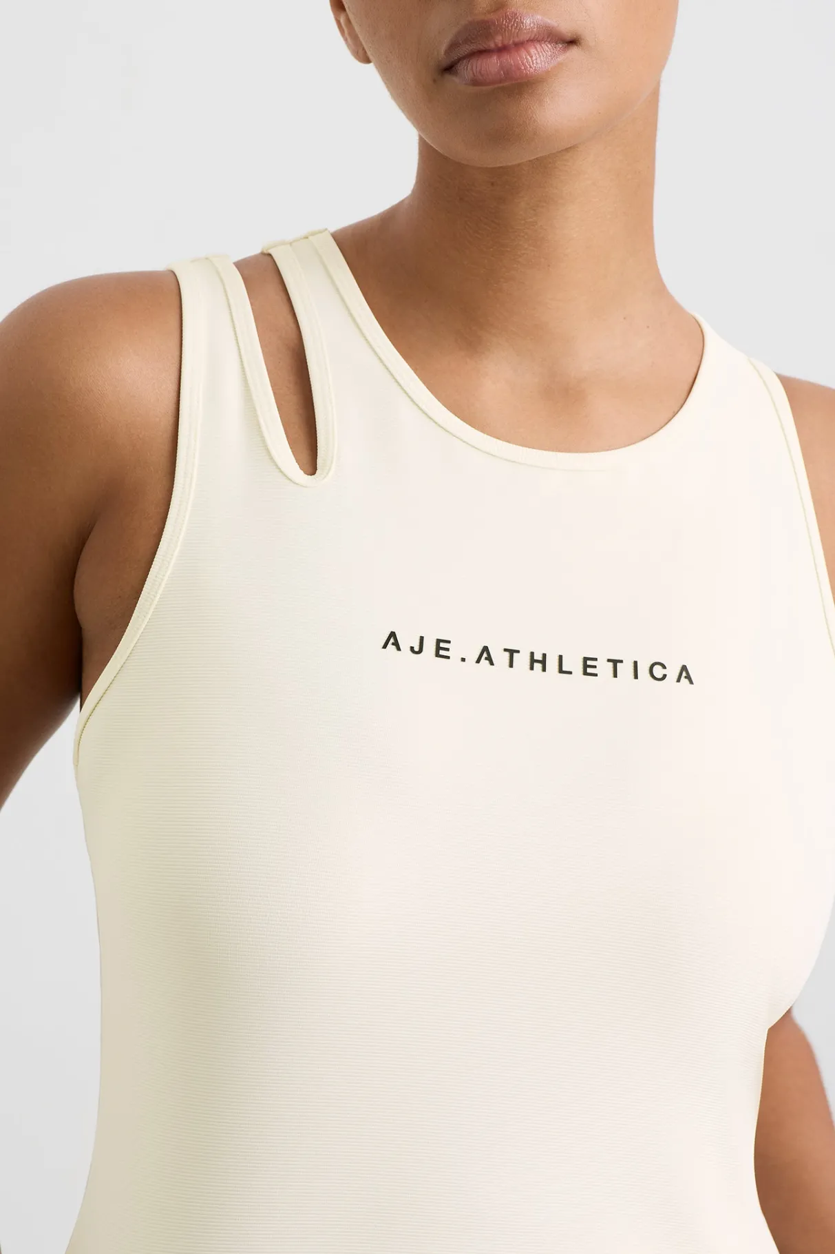 split_strap_tank__8-1.webp New Aje ATHLETICA Split Strap Tank 147 Limestone Beige