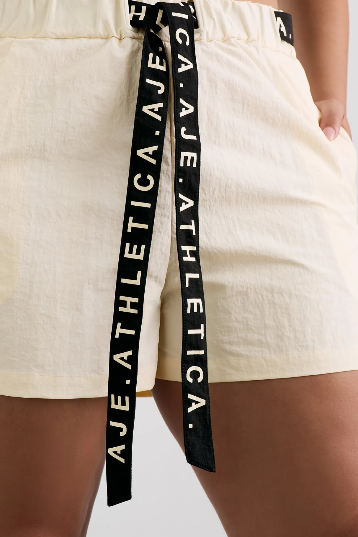 spray_shorts__12-1.webp New Aje ATHLETICA Spray Shorts 608 Limestone Beige Black