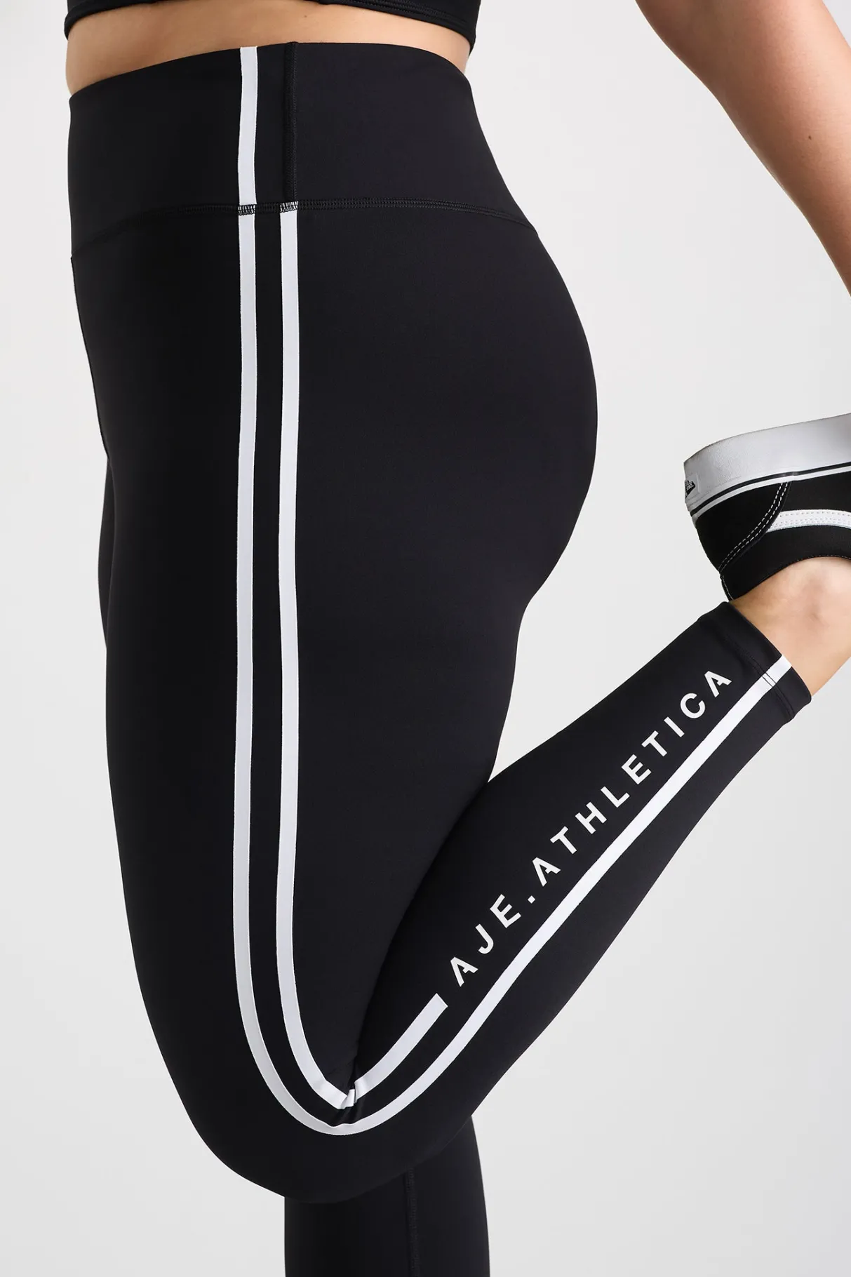 stripe_full_length_legging__14.webp Outlet Aje ATHLETICA Stripe Full Length Legging 232 Black/White