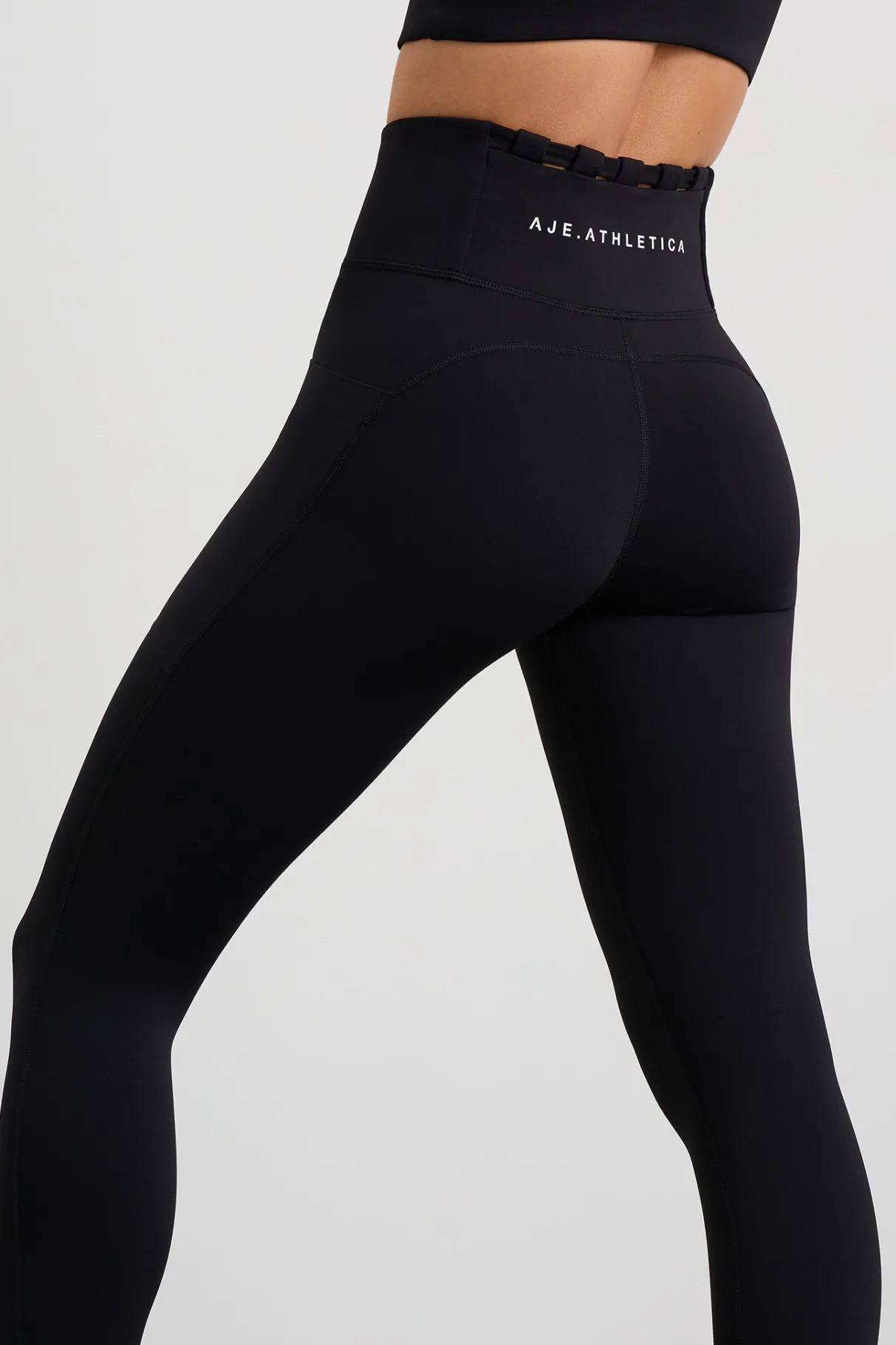thread_through_legging__5.webp Outlet Aje ATHLETICA Thread Through Legging 228 Black/White Logo