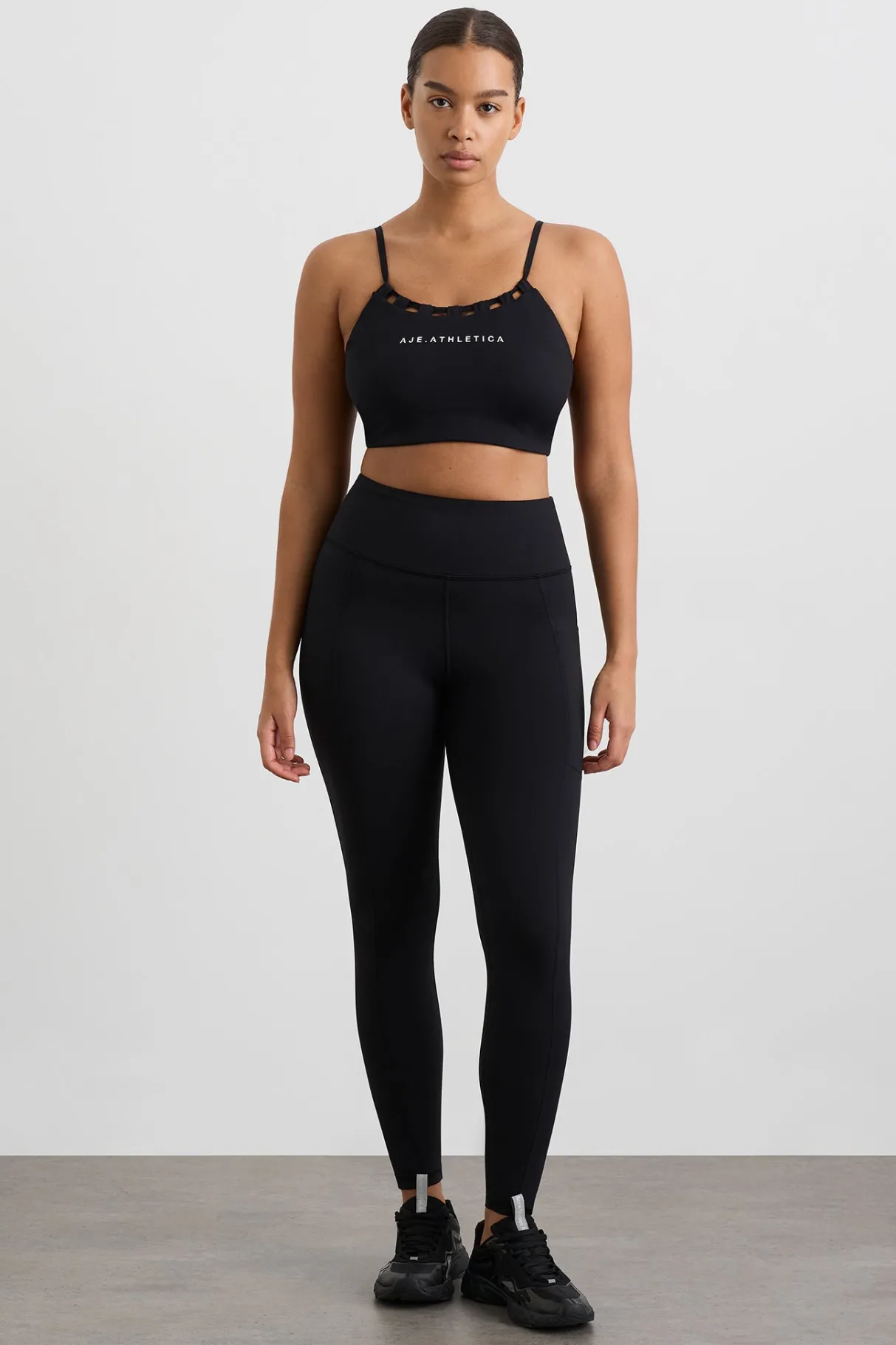 thread_through_sports_bra__7.webp Shop Aje ATHLETICA Thread Through Sports Bra 361 Black/White Logo