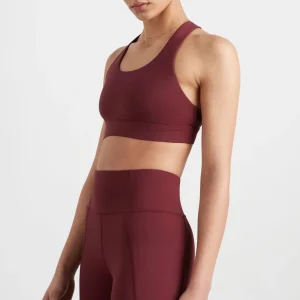 Store Aje ATHLETICA Twist Back Sports Bra 335 Burnt Burgundy/Berry
