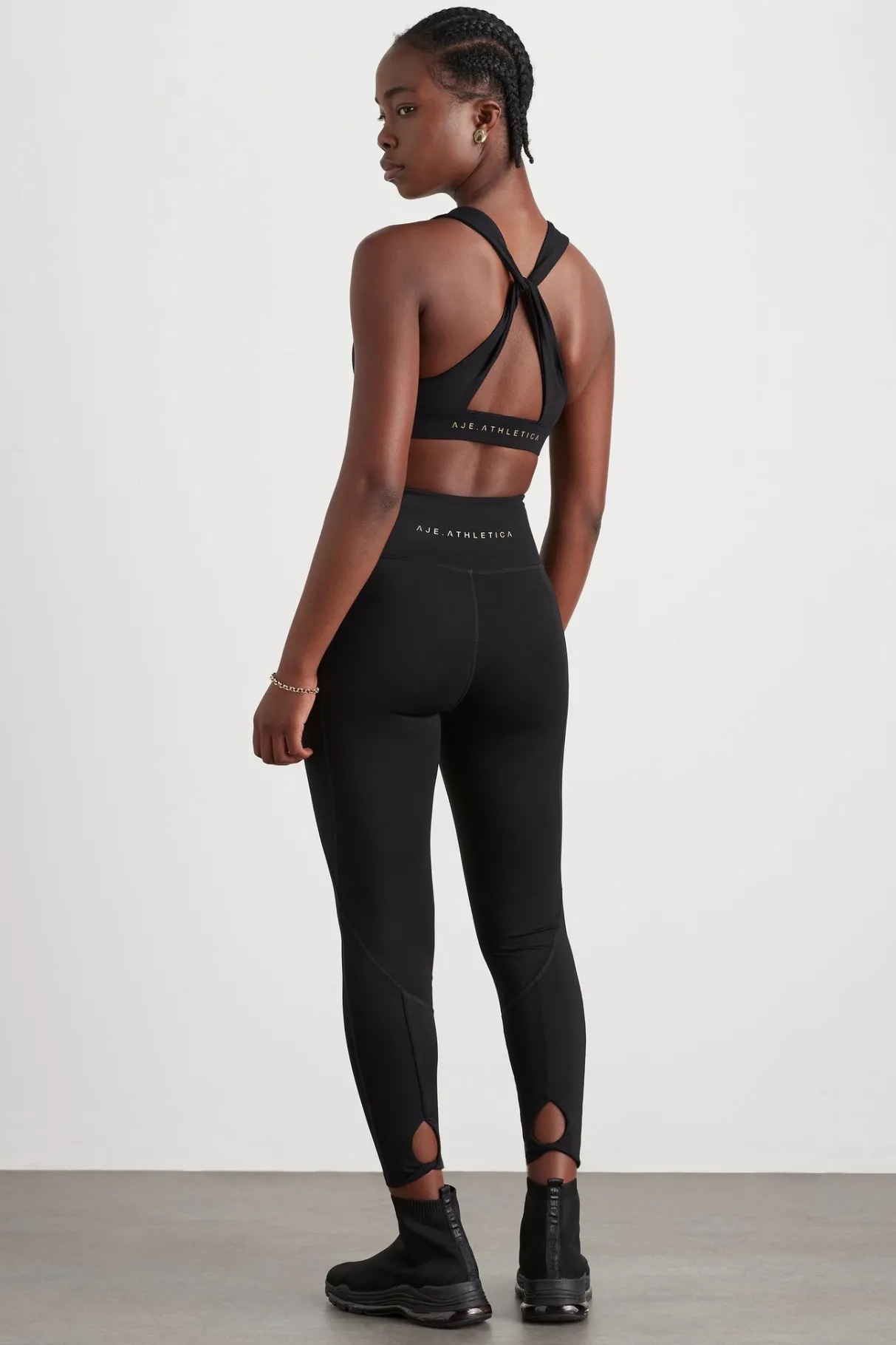 twist_back_sports_bra__4-1.webp Fashion Aje ATHLETICA Twist Back Sports Bra 335 Black/Gold
