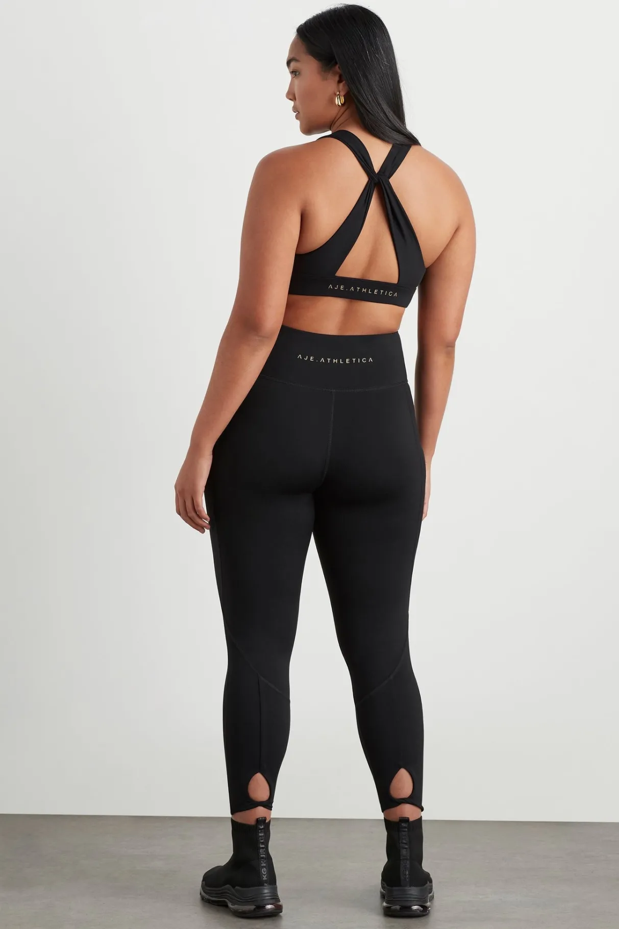 twist_back_sports_bra__8-1.webp Fashion Aje ATHLETICA Twist Back Sports Bra 335 Black/Gold