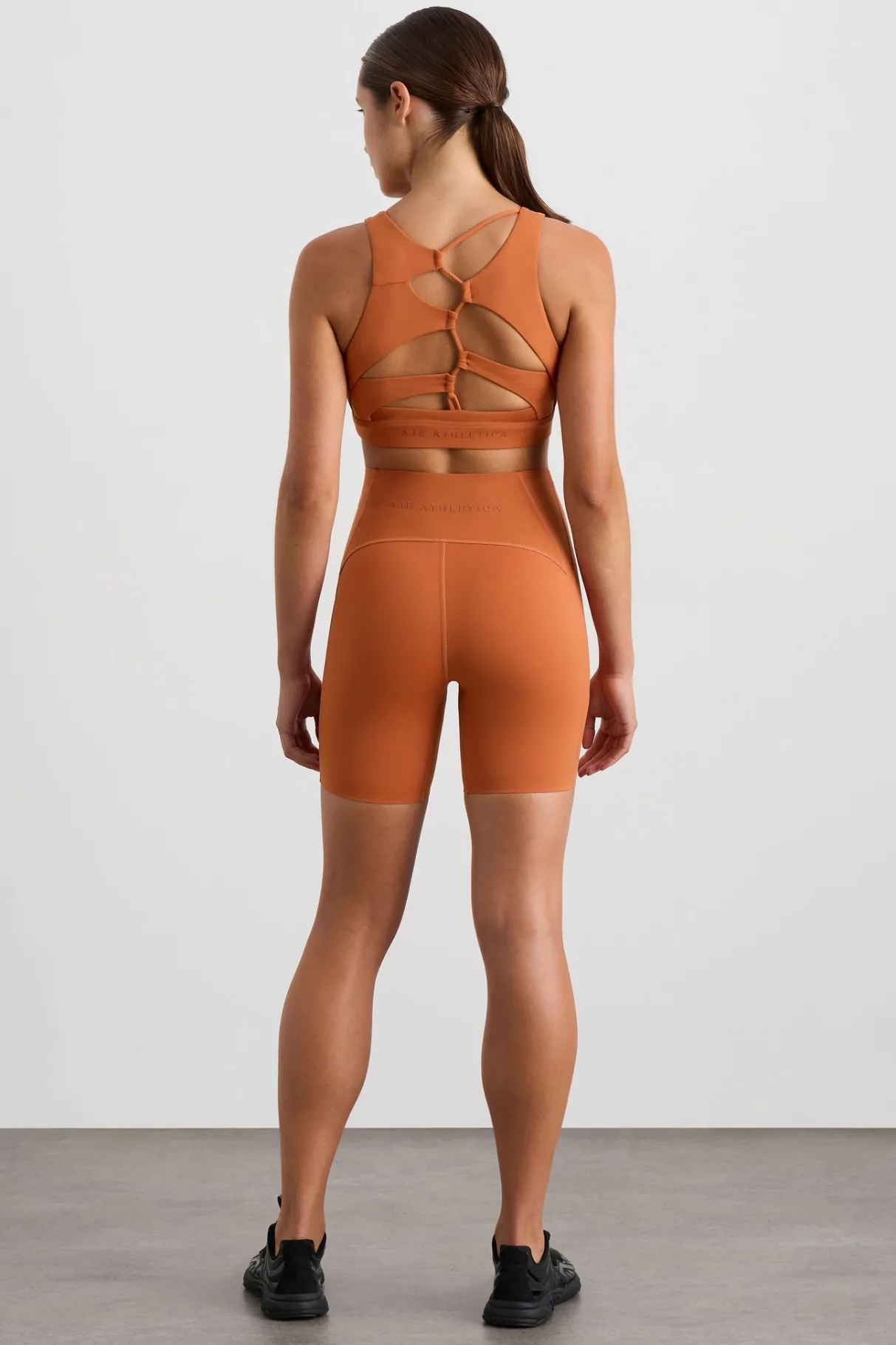winding_road_high_neck_bra__3.webp Clearance Aje ATHLETICA Winding Road High Neck Bra 364 Copper Orange