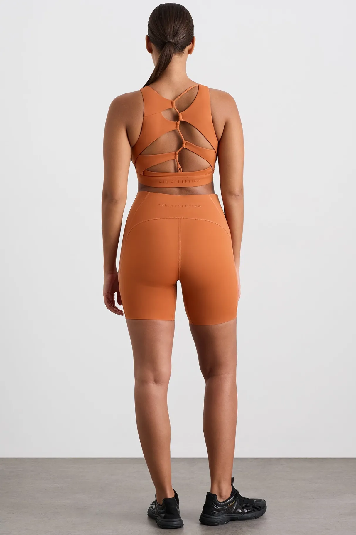 winding_road_high_neck_bra__8.webp Clearance Aje ATHLETICA Winding Road High Neck Bra 364 Copper Orange