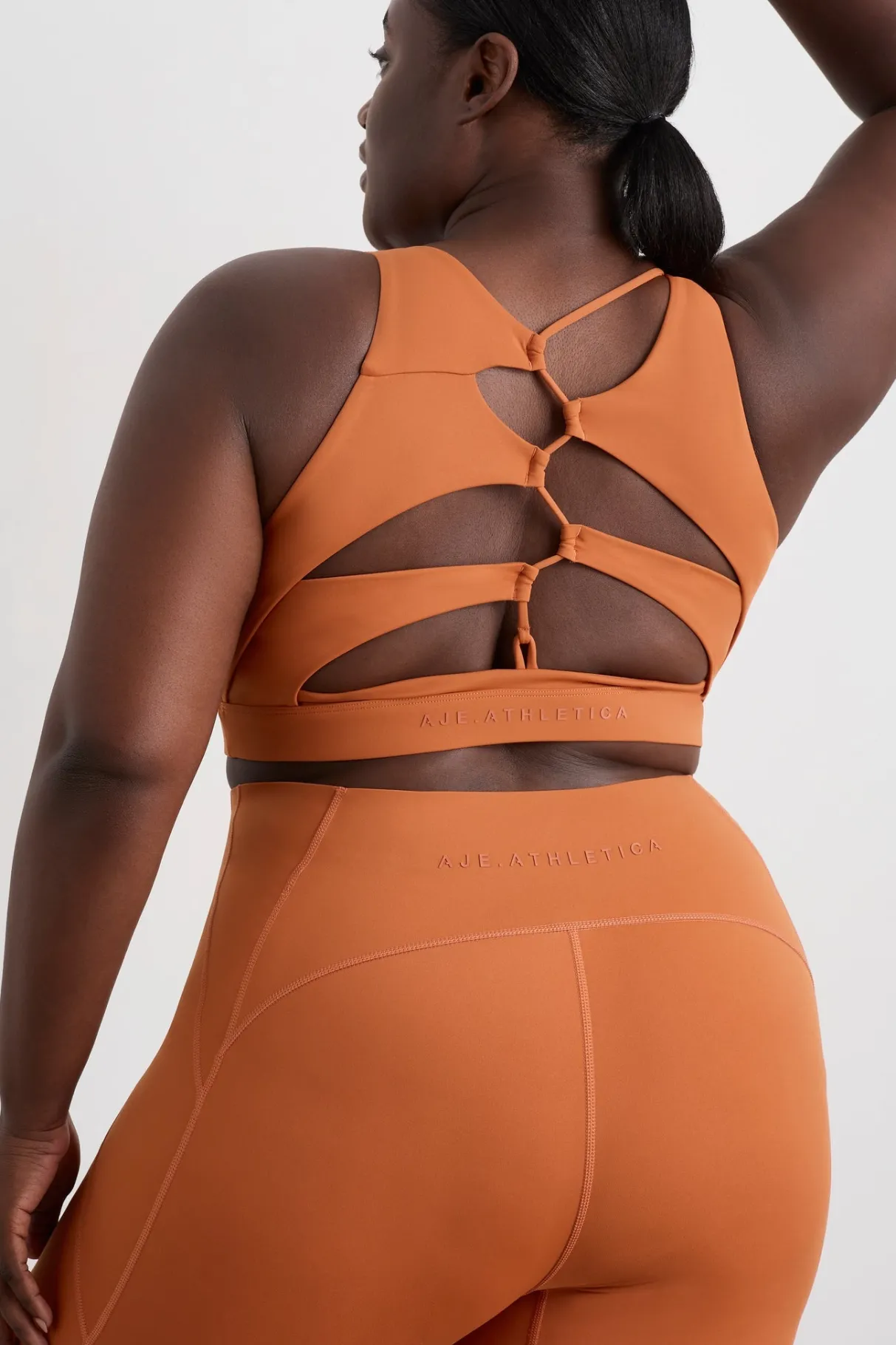 winding_road_high_neck_bra__9.webp Clearance Aje ATHLETICA Winding Road High Neck Bra 364 Copper Orange