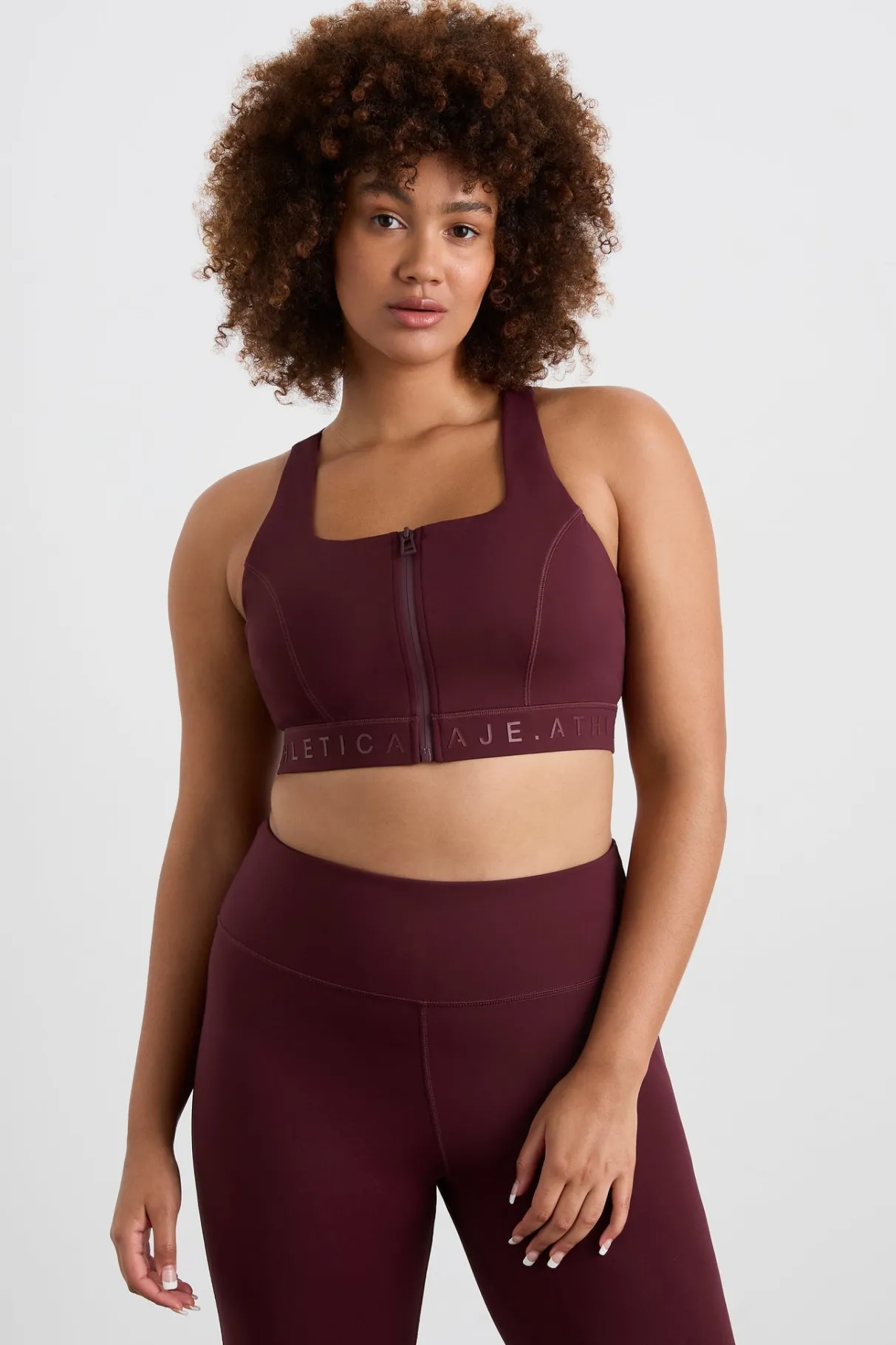 zip_front_logotape_sports_bra__10-1.webp Flash Sale Aje ATHLETICA Zip Front Logotape Sports Bra 319 Burgundy