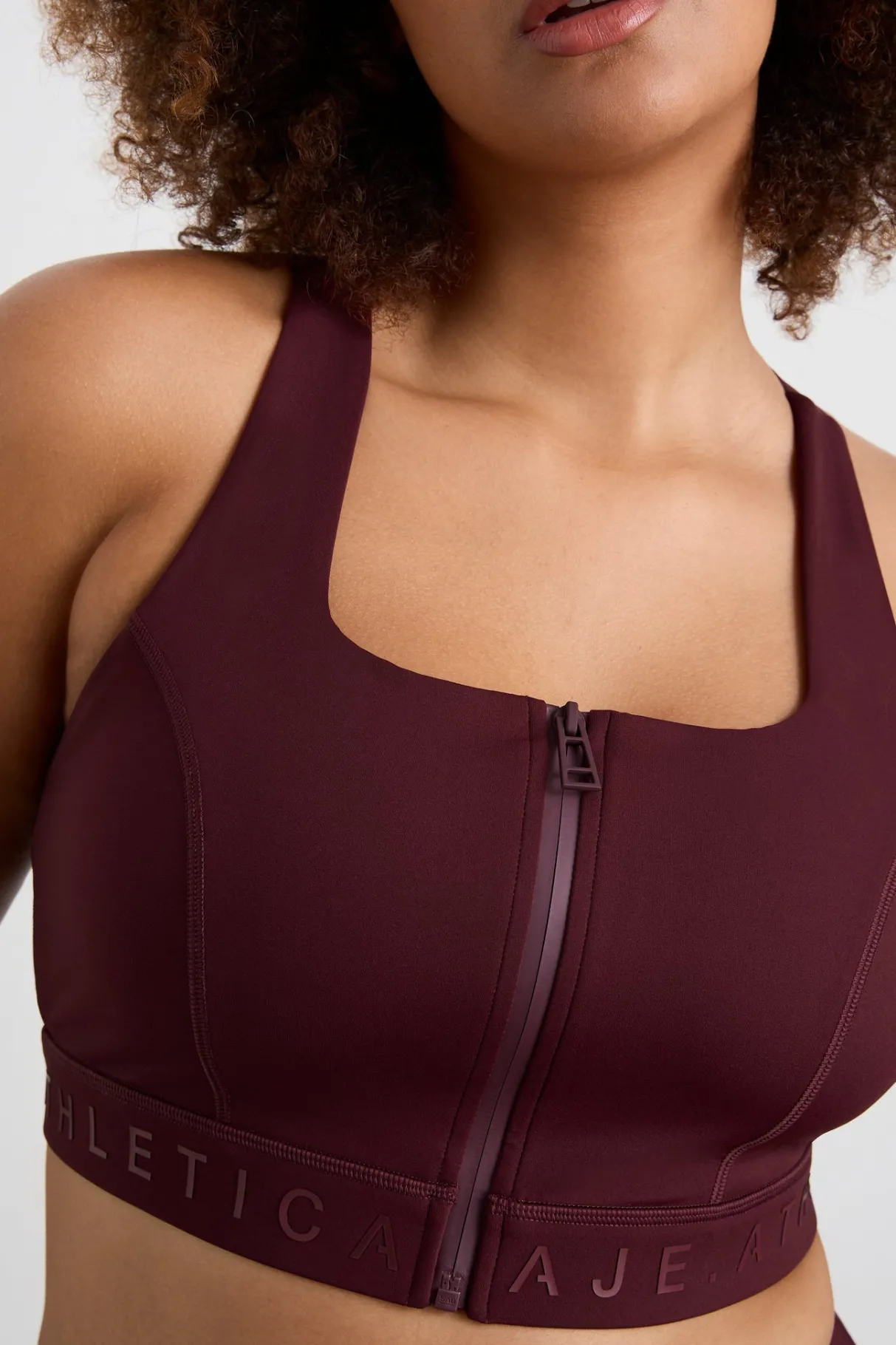 zip_front_logotape_sports_bra__12-1.webp Flash Sale Aje ATHLETICA Zip Front Logotape Sports Bra 319 Burgundy